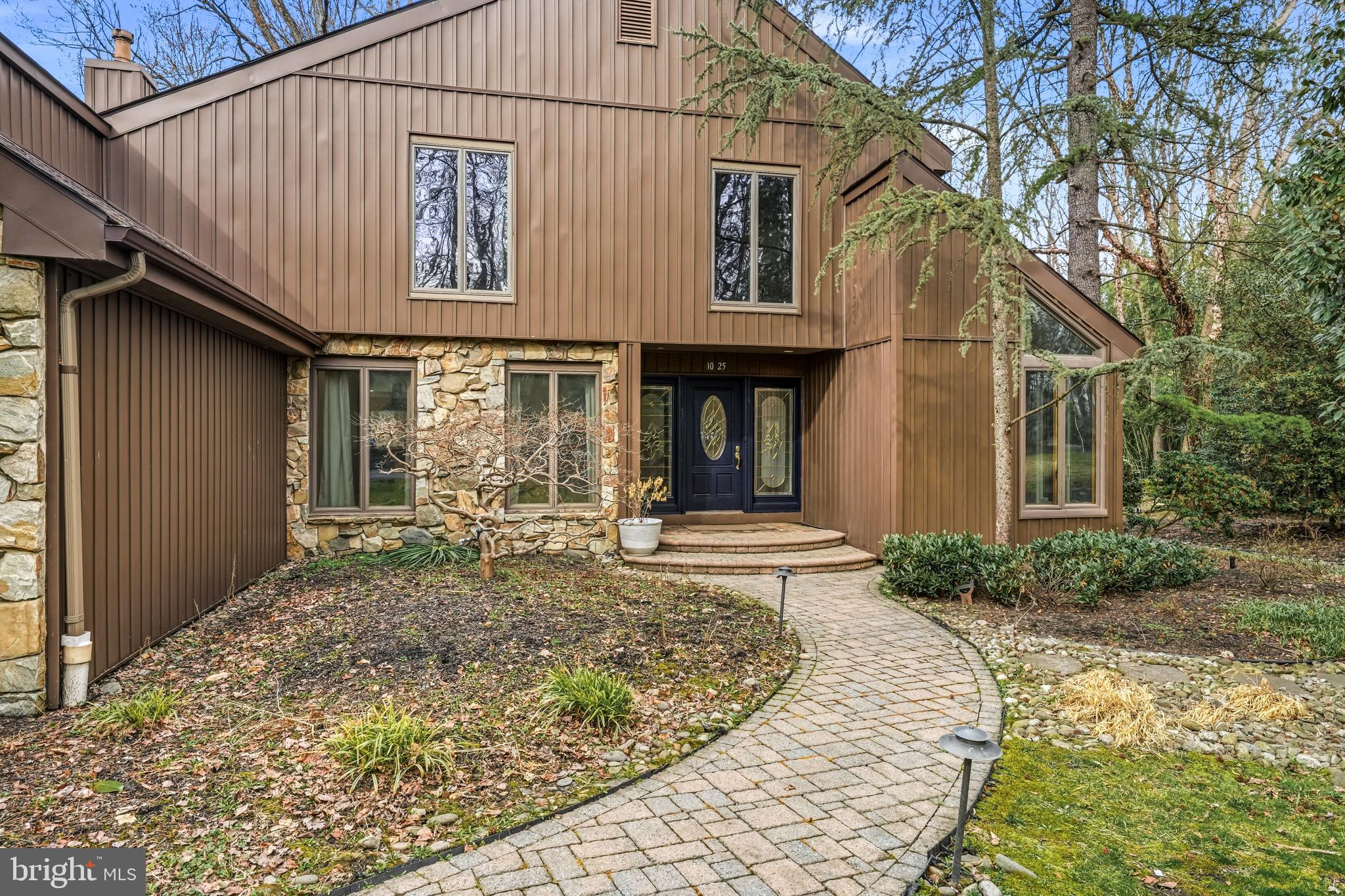 Located in the Reserve section of Moorestown, New Jersey, this distinctive property offers over 3,000 square feet of living space set on more than two private acres along Riverton Road. Surrounded by mature trees and natural landscape, the setting offers space, privacy, and a peaceful atmosphere while remaining close to Moorestown’s shops, dining, and major commuting routes.A picturesque pond creates a beautiful focal point on the property and sets the tone for the entire setting. The water reflects the surrounding trees and open sky, offering a sense of calm that can be enjoyed year-round. Imagine starting the morning with coffee overlooking the water or ending the day watching the sunset across the pond. The grounds invite quiet moments, outdoor gatherings, and time spent enjoying the natural beauty of the land.Inside, the home offers four bedrooms and two and a half baths with a spacious layout designed for comfortable living and entertaining. Cathedral ceilings in the main living areas create an open and airy feel, while large windows allow natural light to fill the space and frame views of the surrounding property.A three-car garage provides generous space for vehicles, storage, or hobby needs while complementing the scale of the home.Tucked within the landscape, a charming cottage adds character and flexibility to the property. It offers a unique space that could serve as a guest retreat, studio, creative workspace, or private escape.With over two acres of land, a scenic pond, soaring cathedral ceilings, a three-car garage, and a cottage nestled within the grounds, this Moorestown property offers space, tranquility, and a setting that feels both private and inviting.