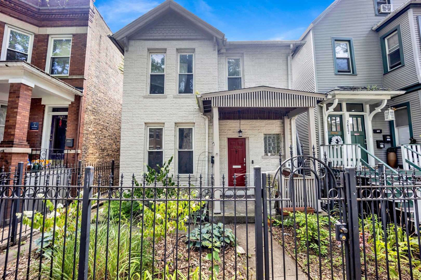 Located in the highly desirable West Bucktown / Logan Square area, this updated 2-story brick home features a 2-car garage, spacious open floor plan, and wood floors. The kitchen boasts stainless steel appliances, instant hot water, quartz countertops, and an oversized island. The first floor also offers a laundry area with a convenient half bath and a mudroom leading to the rear deck and mature backyard.  Upstairs, you'll find three bedrooms and two baths, including a primary suite with exposed brick, ample closet space, a walk-out deck, and a bathroom with a separate shower and jacuzzi tub. The home also has a newer roof, HVAC, furnace, and water heater (all within the past five years), plus an unfinished basement for storage or future expansion.  Conveniently located near I-90/94, the Blue Line, the 606 Trail, and Holstein Park, with neighborhood favorites like Allez Cafe, Wasabi Ramen, Margie's, and Agora Grocery just minutes away.