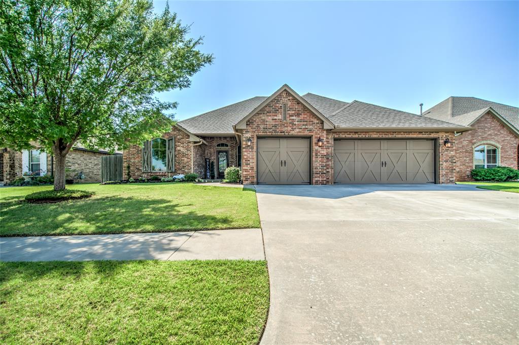 There is so much to love about this inviting home in the gated Lone Oak Cove community! The naturally lighted, open floor plan, classic craftsmanship and attention to detail truly makes this home next tier! Impressive hardwood floors welcome you into the huge dining and living areas open to the granite, stainless steel kitchen with gas cooktop, tons of counter space and abundant storage in the custom cabinetry.  Relax in your large primary suite with it's generous bath featuring a soaking tub, walk-in shower, and his and hers dual vanities. Enjoy your large backyard while staying cool under the ceiling fans of the covered patio with stained concrete and decorative lighting. This home features 3 bedrooms, 2 and half baths, a study, 3 car garage with a peace of mind, in-ground storm shelter. Desirable Deer Creek Schools and within minutes of the Parkway and Kilpatrick for quick access to anywhere in the city.