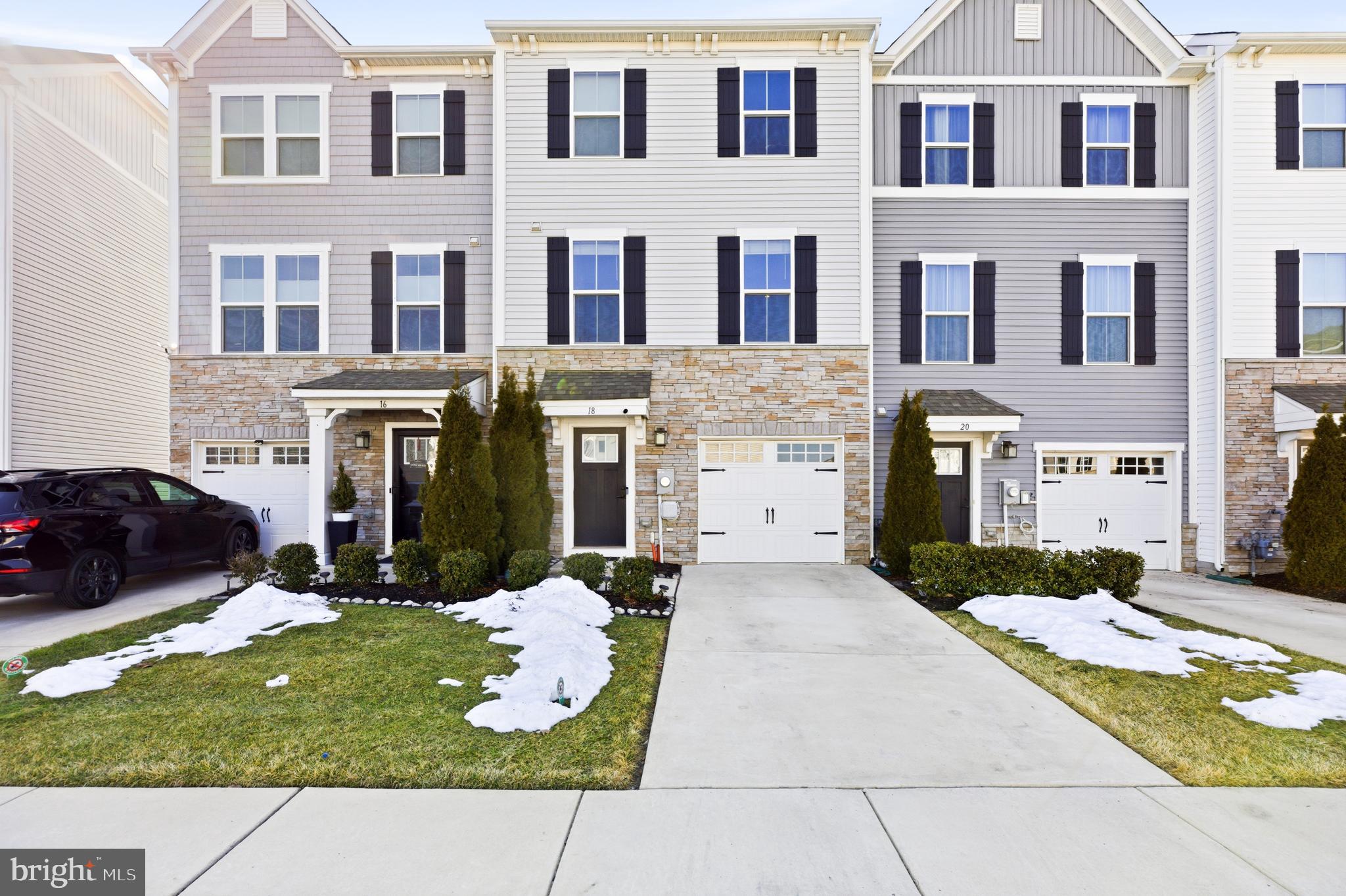 Welcome to this modern townhouse in the highly desirable community of The Townes at Haddon Point in Pennsauken, NJ. Built in 2020, this 1,900+ sq. ft. home offers contemporary design, low‑maintenance living, and excellent curb appeal.The entry level features a welcoming foyer, access to the attached garage, and a versatile bonus space ideal for a second living area, home office, gym, or recreation room. This level also provides direct access to the backyard, which is open and unobstructed by neighboring buildings—offering privacy, natural ventilation, and beautiful sunrise and sunset views.Upstairs, the main level showcases a bright, open‑concept living area with large windows that fill the space with natural light. The upgraded gourmet kitchen includes stainless steel appliances, quartz countertops, a large island, and abundant cabinetry. A dining area and powder room complete this level, along with sliding doors that lead to a private Trex deck—perfect for morning coffee or evening entertaining.The upper level features a spacious primary suite with plush carpeting and a spa‑like en‑suite bath. Two additional bedrooms, a hall bath, and a convenient upper‑level laundry room complete the floor. A lower‑level patio and the elevated deck provide multiple outdoor spaces for relaxation.This home is minutes from Philadelphia, major highways, shopping, and dining, offering an ideal blend of comfort and commuter convenience. The community benefits from a low HOA fee and a 30‑year tax abatement, making the cost of living highly affordable. Single ownership and meticulous maintenance further enhance the value of this exceptional property.