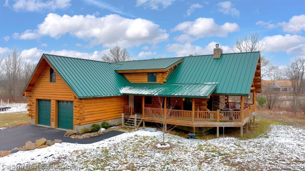 A rare opportunity to own a true piece of Michigan craftsmanship.This stunning  custom log home, featuring 3 bedrooms and 2.5 baths, was hand-built by Amish craftsmen in Northern Michigan, then carefully delivered and assembled log by log on site. Many of the logs used throughout the interior were sourced directly from the property itself—making this home a genuine, one-of-a-kind Michigan original.Set on over 7 acres of peaceful land with a private pond, the property offers privacy, beauty, and room to enjoy the outdoors. The property is an excellent deer and turkey habitat and offers hiking and horse trails. A 2-car garage with industrial-height ceilings provides ample space for vehicles, tools, and recreational toys.Inside, the home blends rustic character with modern comforts with added features like reverse osmosis system, 44 Elite Fireplace, electric heated flooring in the primary bathroom, and a bonus room with endless possibilities.  Please refer to the list of special features of the home that is available with the disclosures.The spacious layout is complemented by a huge covered deck and wrap-around porch, perfect for relaxing, entertaining, or taking in the natural surroundings. This home is a true example of handmade excellence in Michigan, offering timeless log construction, thoughtful updates, and exceptional land—all in one remarkable property.AGENTS PLEASE REFER TO AGENT REMARKS FOR MORE INFO.All showings must be accompanied by a licensed real estate agent BATVIAll furnishing are for sale as well and will be sold separately from sale of home.
