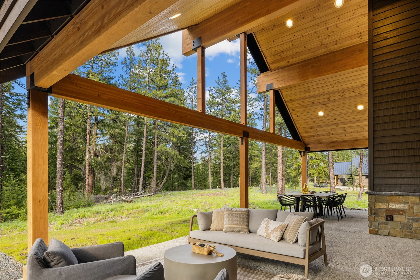 Large covered back patio up against the conservancy.