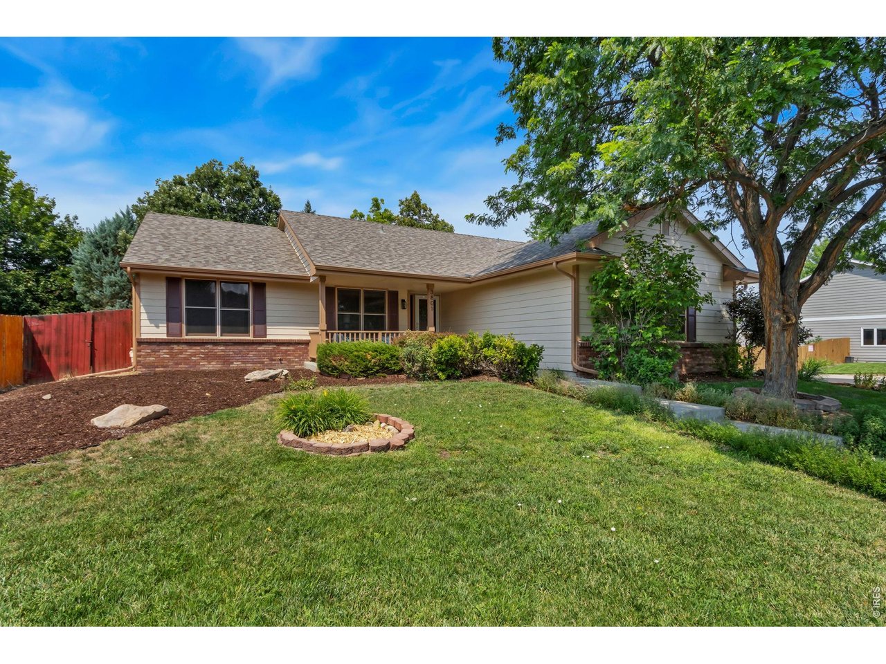 This English Ranch home is ready to welcome you with new updates, a fantastic floor plan, and no HOA. Situated on a desirable corner lot with beautiful curb appeal, mature landscaping, and a welcoming covered front porch, this move-in ready ranch offers the ease of main-level living with room to spread out. The bright, open floor plan features new interior paint, updated light fixtures, new stainless steel appliances, and a beautifully updated kitchen with quartz countertops and a full quartz backsplash. The dining area opens to the spacious deck, making it easy to enjoy summer BBQs, morning coffee, or evenings under the shade of mature trees. The main level includes a spacious primary suite with a walk-in closet, a second bedroom, full bath, dedicated office with french doors, convenient laundry room, and powder room. The finished basement, with new carpet, expands your living space with two additional bedrooms, a 3/4 bath, a large rec room, a versatile bonus space, and extensive built-in bookcases, perfect for a home library, hobbies, or extra storage. Additional updates include a new roof (2025) and exterior paint (2025). Ideally located minutes to English Ranch Park, schools, trails, shopping, and dining. Pre-inspected for added peace of mind.