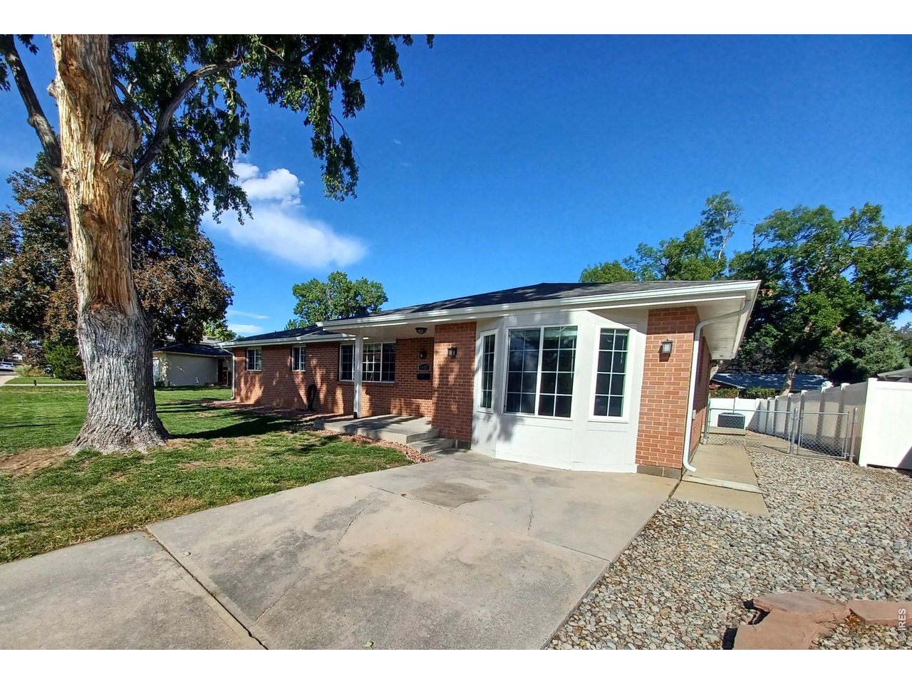 A Longmont Gem! This move-in-ready, low-maintenance brick ranch perfectly blends classic charm with everyday convenience in a desirable Central Longmont location. Featuring 3 bedrooms, 1.5 baths, beautiful hardwood floors, and central air conditioning, this solid home is ready for you to make it your own. Enjoy peace of mind with a new roof in 2024 and fall in love with the inviting outdoor living space, where French doors open from the kitchen to a covered patio overlooking a spacious, fully fenced backyard with a sprinkler system and large storage shed. Tucked away on a quiet, non-through street, this delightful property offers the perfect combination of comfort, functionality, main level living, and no HOA. Don't miss this wonderful opportunity to own this charming home in a fantastic location!