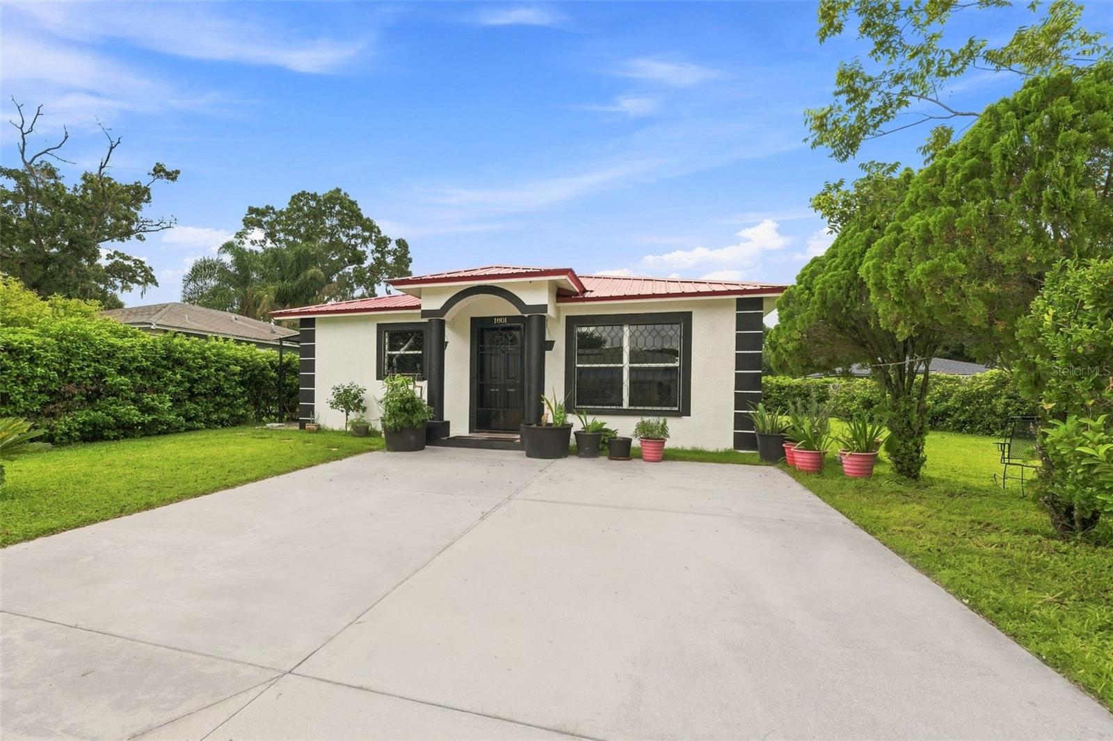 This charming Plant City home is a great opportunity for first time buyers! Built in 2002 and featuring a 2-year-old metal roof, this home sits on a desirable corner lot with a spacious yard perfect for relaxing, entertaining, or family fun. Conveniently located with easy access to I-4, making commutes to Tampa, Lakeland, and surrounding areas a breeze. Affordable, inviting, and ready for its next owner. Come make this home yours!