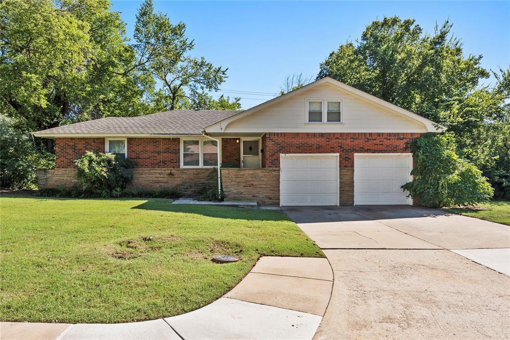 Welcome to one of Central Edmond's most sought-after locations, where opportunities to own are few and far between.  This charming home offers an unbeatable location on a quiet, tree-lined street adjacent to a small charming neighborhood park; the perfect blend of location, space, and potential.  Inside, you'll find a spacious living room that flows into a separate dining area, creating comfortable spaces for everyday living.  This home features a flexible floor plan with two spacious bedrooms downstairs, one full bath, a convenient half bath, and an oversized upstairs bedroom that can serve as a private primary suite, guest retreat, home office, bonus room, or hobby space. The inviting living room flows into a separate dining area, while the generously sized kitchen offers abundant cabinet storage, ample countertop space, and plenty of room for everyday living. Step outside to enjoy the large wood fenced backyard and open patio—ideal for entertaining, relaxing, gardening, or creating your own outdoor retreat. A two-car attached garage is a valuable feature for homes of this era, and the recently installed roof provides is an added value, providing peace of mind.  Whether you're looking for your next home, a property with room to grow, space for roommates or an investment opportunity in one of Edmond's most established neighborhoods, this home offers endless possibilities.  Enjoy the convenience of being within walking distance of schools, restaurants, shopping, parks, and everyday amenities, while also being just minutes from UCO (The University of Central OK) and Downtown Edmond.  NOTE:  The ROOF was replaced in July 2025.