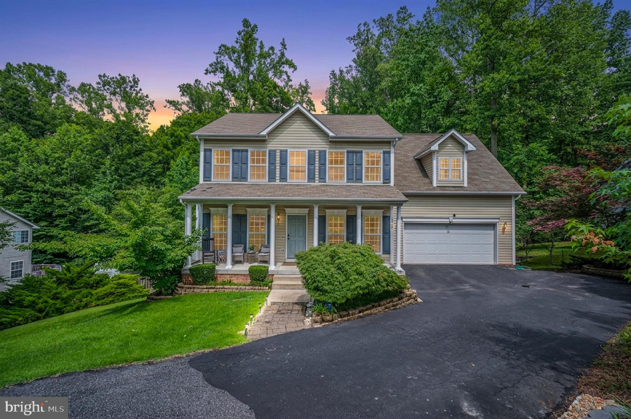 Welcome home to Presidential Lakes! This charming 3‑level Colonial offers a 2‑car attached garage, full walk‑out basement, spacious deck, and a covered front porch perfect for relaxing outdoors. Inside, you’ll find 4 bedrooms and 3.5 baths, providing comfortable living space for family and guests. Enjoy the convenience of easy access to Route 3, I‑95, and 301, making commuting simple. A wonderful home in a community known for its amenities and welcoming atmosphere — we look forward to seeing you!
