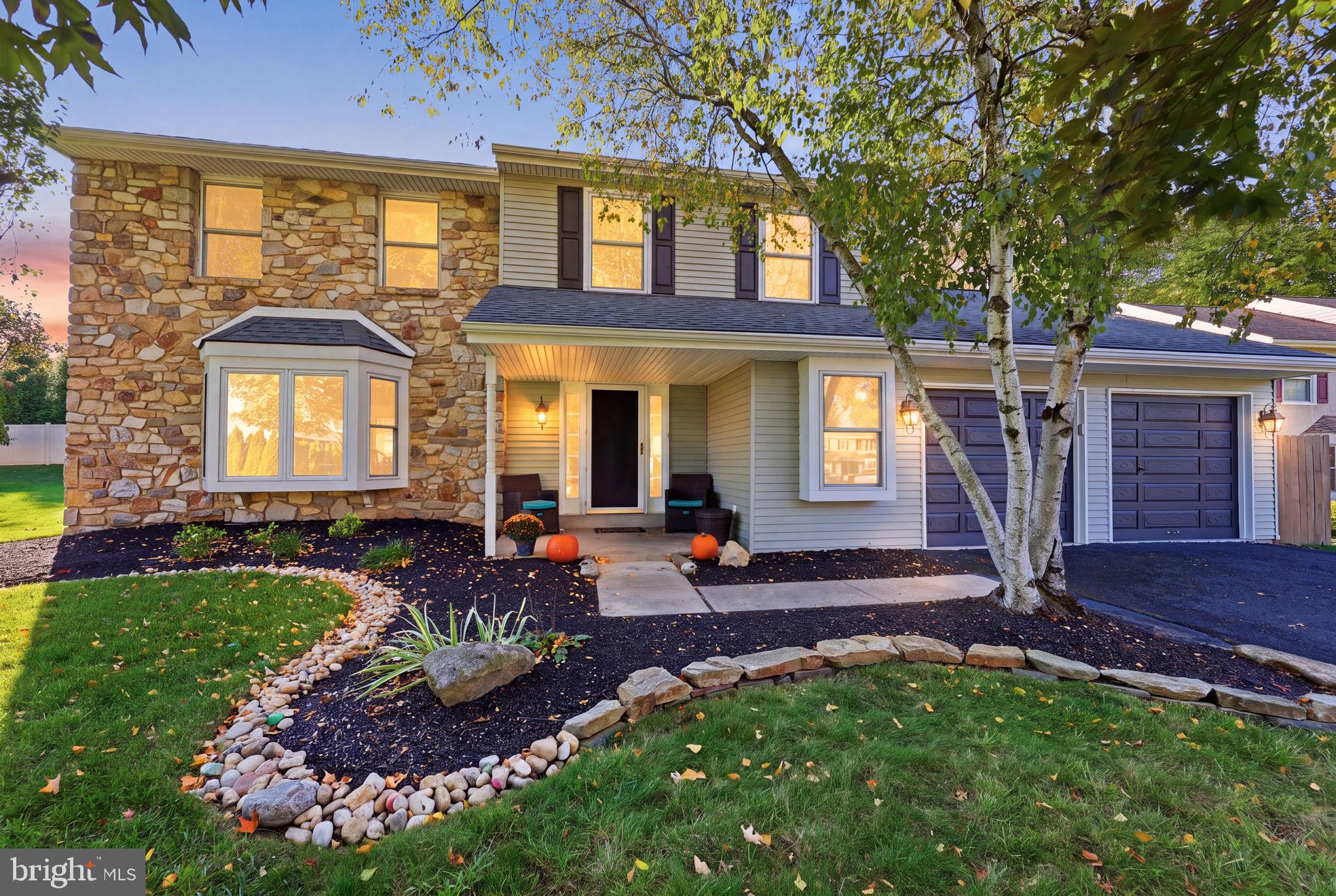 Located in the highly desirable Council Rock School District, this home is tucked away on a quiet cul-de-sac with no through traffic, offering a more peaceful setting. The grand entryway was modified by the sellers and welcomes you with widened steps and an attractive railing, creating a distinctive first impression that sets this home apart from neighboring properties. The eat-in kitchen offers extra pantry space, soft-close cabinets, and a five-person island. The large family room features a wood-burning fireplace, and the living room offers a charming bay window and classic chair rail. Upstairs, the primary suite features two walk-in closets, a linen closet, a built-in vanity, and an en-suite bath. Main floor laundry includes a utility sink and storage, along with a convenient powder room. You’ll also find a finished basement with a storage closet, a two-car garage with a workbench and storage, plus a four-car driveway. Roof replaced in 2023 with new gutters with leaf guard add peace of mind. HVAC serviced within the last year and a french drain system runs around the home. There’s even a discreet fenced garbage area! Outside, you get a covered front porch with stone accents, patio space, a fire pit area, and even a hill perfect for winter sledding. Thoughtful updates, generous spaces, and ready for its next owners.