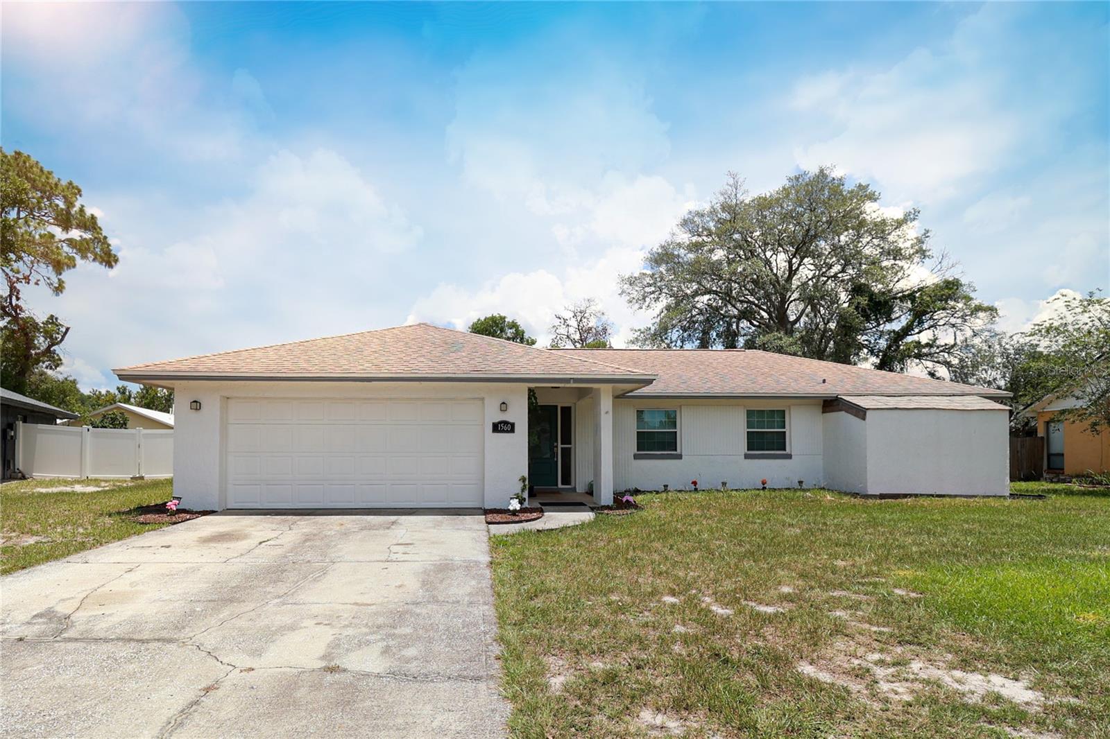 Price adjustment...., Wonderful opportunity to enjoy comfortable Florida living in a well-established neighborhood With NO HOA!! Step inside to discover bright, open living spaces filled with natural light, creating a warm and welcoming atmosphere. The upgraded high-end kitchen serves as the heart of the home, offering ample cabinet, modern appliances and counter space to prepare meals with ease. With desirable split floor plan that's perfect for today's lifestyle. The thoughtfully designed layout separates the primary suite from the 3 additional bedrooms, creating a private retreat while providing ideal space for family, guests, or a home office.Step outside to your private screened-in patio. Enjoy a private over 0.30 Acre backyard with endless possibilities—whether you envision weekend barbecues, gardening, or creating your own outdoor oasis. Conveniently located near shopping, dining, parks, top-rated schools, and major highways, this home offers easy access to Downtown Orlando and Central Florida's world-famous attractions.Whether you're searching for your forever home or your next investment, 1560 Guinevere Drive combines a functional layout, an excellent location, and the comfort you've been looking for. Schedule your private showing today and discover this wonderful home!
