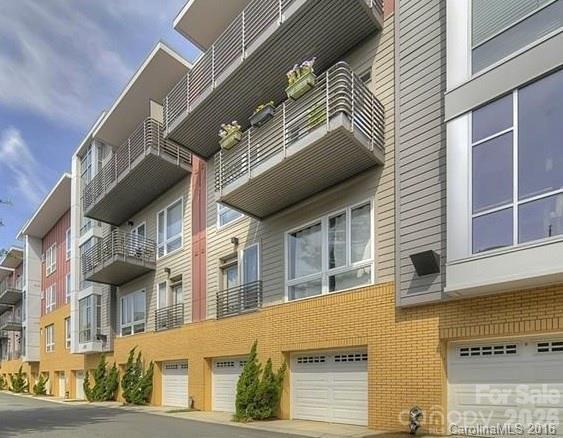 Immaculate condo in the heart of Southend with an extra deep garage! Located within seconds to nightlife, restaurants, Publix, Lowe's, the light rail, and all of the Southend hotspots! This well maintained condo features impressive floor to ceiling windows, granite countertops, stainless steel appliances and more.  The large bedroom gets great natural light and has a cool built in closet system.  This bright and light filled modern home is a great place to unwind or a great base to explore all that Historic Dilworth and SouthEnd affords.   Outside your door at the Southborough community you find tree-lined sidewalks, gardens, fountains and ample parks.  Check out the location and how nice it is to leave the car and explore the area.  Unit 105 is actually on the second floor.  The modern buildings have large staircases and elevators.  Check out the interior courtyards for socializing with neighbors or enjoying a book on a nice day! Take a look today!