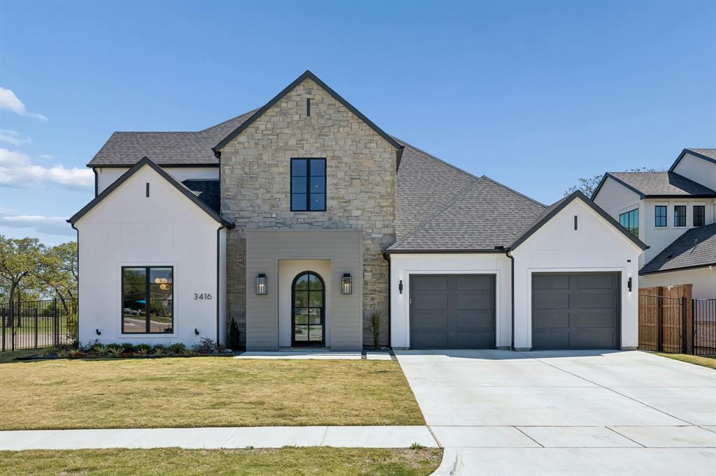 Step into this bespoke showpiece by V Patrick Gray Homes, nestled on a corner lot in the back of the new Ferguson subdivision and zoned to the  award-winning Carroll ISD. Designed with a perfect blend of elegance, comfort, and livability, this transitional gem offers a seamless balance of luxury and practicality. Spanning 4,213 sq ft with 4 bedrooms - 2 conveniently located first-floor - 4.1 baths and 2 Car Garage, this home is a true standout.From the moment you enter, the rich hardwood floors and warm wood accents guide you through a space where every detail has been thoughtfully curated. At the heart of the home lies a chef’s kitchen outfitted with top-of-the-line Thermador appliances, custom cabinetry, and a spacious walk-in pantry—tailor-made for effortless entertaining. The inviting open-concept living area is anchored by a stunning designer fireplace, creating a cozy yet sophisticated ambiance. Whether hosting a gathering or enjoying everyday moments, this home has spaces designed for every occasion. In addition to spacious game room up are 2 beds with ensuite baths and a dedicated media room - perfect for movie nights or game-day celebrations. Step outside to discover a covered patio, gas fireplace, phantom screens and view of expansive greenbelt and fountain—ideal for al fresco dining with a view. The energy-efficient design and abundance of natural light throughout the home enhance its charm and functionality, providing a space that feels as good as it looks. The grand entry sets the tone for the serene retreats within, including the tranquil primary suite that offers a private sanctuary of modern sophistication. Designer finishes throughout elevate the home’s aesthetic, creating a refined yet welcoming atmosphere that will captivate you at every turn. This home isn’t just a place to live—it’s where memories are made. From impeccable craftsmanship to spaces designed with both style & comfort in mind, this property redefines modern living. Welcome home!