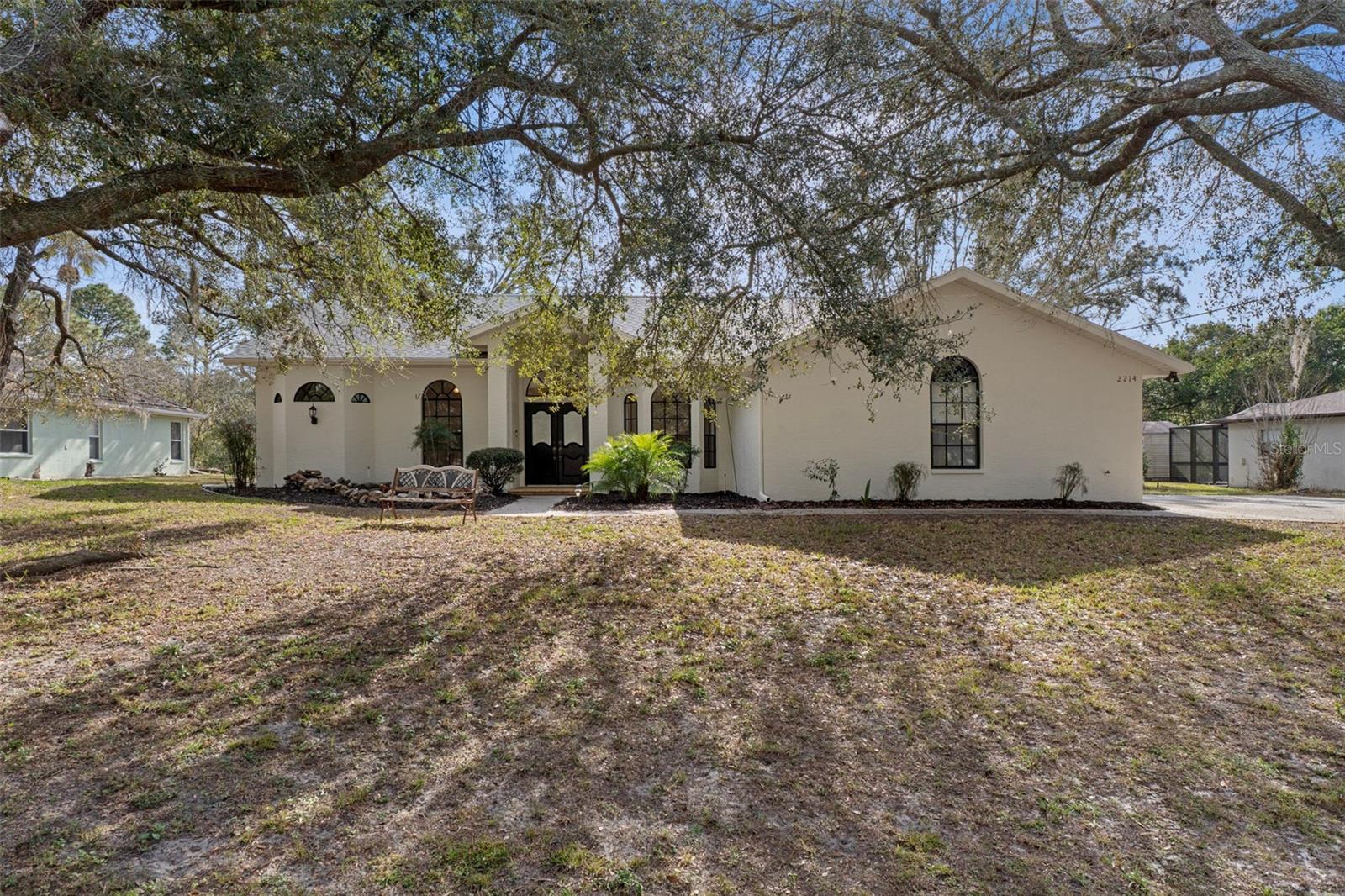 Amazing opportunity to own this charming home located in desirable Spring Hill, Beautiful 3-bedroom, 2-bath pool home featuring an open floorplan and high ceilings that create a bright, spacious feel. Enjoy indoor-outdoor living with a screened pool enclosure overlooking a park-like backyard. Nicely landscaped grounds offer great curb appeal, plus a storage shed for added convenience. A flex room provides versatile space for an office, playroom, or guest area. Conveniently located to Suncoast Parkway, shopping, and schools. NO HOA! Repaired Sinkhole. Docs available.