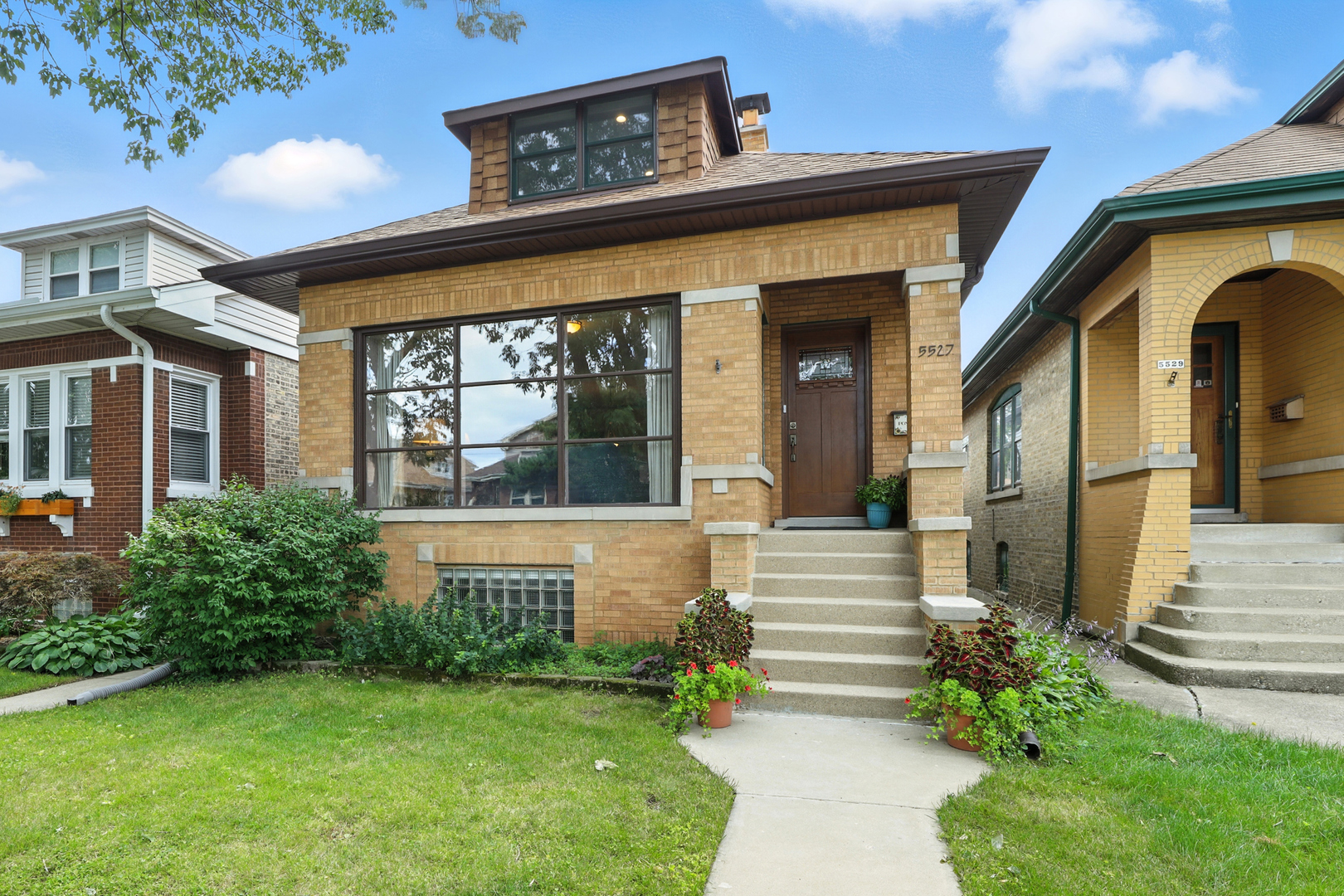 Highest and best by Monday 9/15/25 at 11am please. Beautifully maintained, classic brick bungalow minutes from Portage Park, CTA Blue Line, Metra, I90/I94.  Natural woodwork and trim.  Living Room & Formal Dining room with a wall of windows.  Diagonal wood flooring with cherry strips.  Foyer with classic mosaic tile & entry closet.  Fireplace in the LR and lower level haven't been used in some time and might need some repair (selling as is)  Updated kitchen with built in seating area. Bedroom on 1st floor has a walk in closet.   Baths on every level.  Full bath up with double sink. 1st floor bathroom w/quartz.   LL bath has separate whirlpool tub and walk in shower.  Roof approximately 3 years old. Basement has 7.1 ceiling height with family room, bedroom, laundry & bath.  Newer H2O. Older central air. This property is loaded with original charm from the front door all the way in.