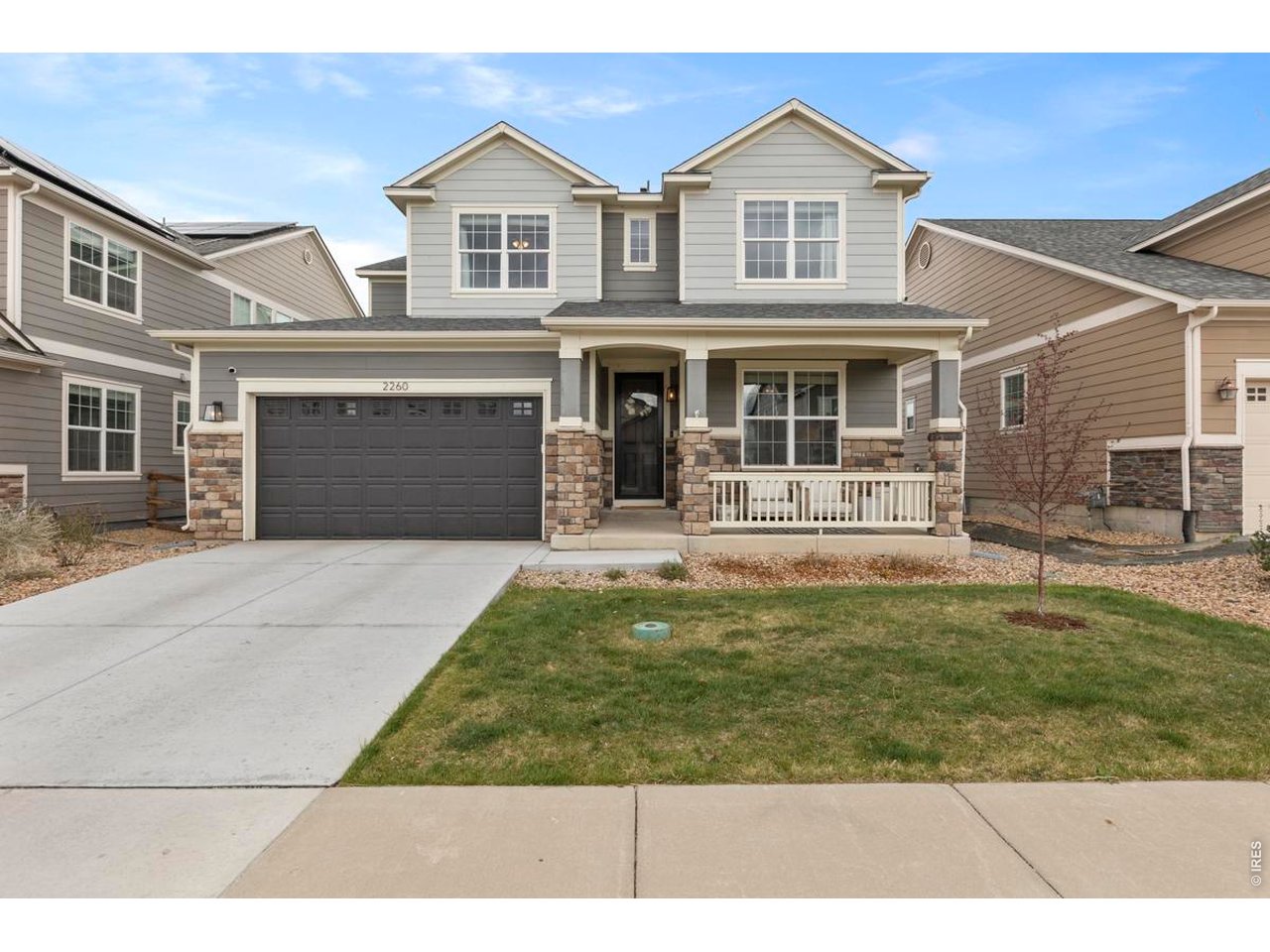 Beautifully refreshed and perfectly positioned on one of Mail Creek Crossing's most desirable lots, this exceptional home backs directly to open space, offering rare privacy, peaceful views, and an effortless Colorado lifestyle. Designed with both everyday living and entertaining in mind, the light-filled floor plan features soaring vaulted ceilings, expansive windows, and timeless finishes throughout. At the heart of the home, the gourmet kitchen showcases an oversized quartz island, white cabinetry, stainless steel appliances with a gas cooktop, custom backsplash, walk-in pantry, and an inviting dining area that flows seamlessly into the spacious great room with a cozy fireplace. The upper level offers a luxurious primary retreat overlooking the open space, complete with a spa-inspired five-piece bath, soaking tub, dual vanities, and dual walk-in closets. Two additional bedrooms share a Jack-and-Jill bath, while a fourth bedroom enjoys its own private ensuite, creating an ideal layout for family or guests. The full unfinished basement offers exceptional potential to create additional living space, a home gym, theater, or guest suite tailored to your lifestyle. Tankless hot water heater and two AC's set this home apart. Plus a tandem 3-car garage! Recently refreshed with professional landscaping, fresh interior paint touch-ups, professional cleaning, carpet cleaning, and thoughtful staging, this home is move-in ready and showcases beautifully. Located just minutes from the new Tail Winds Park, the recently expanded Power Line Bike Trail, top-rated Poudre schools including close proximity to Bacon Elementary, shopping, dining, and convenient access to I-25, this is a rare opportunity to own a beautifully appointed home in one of Southeast Fort Collins' most sought-after neighborhoods.