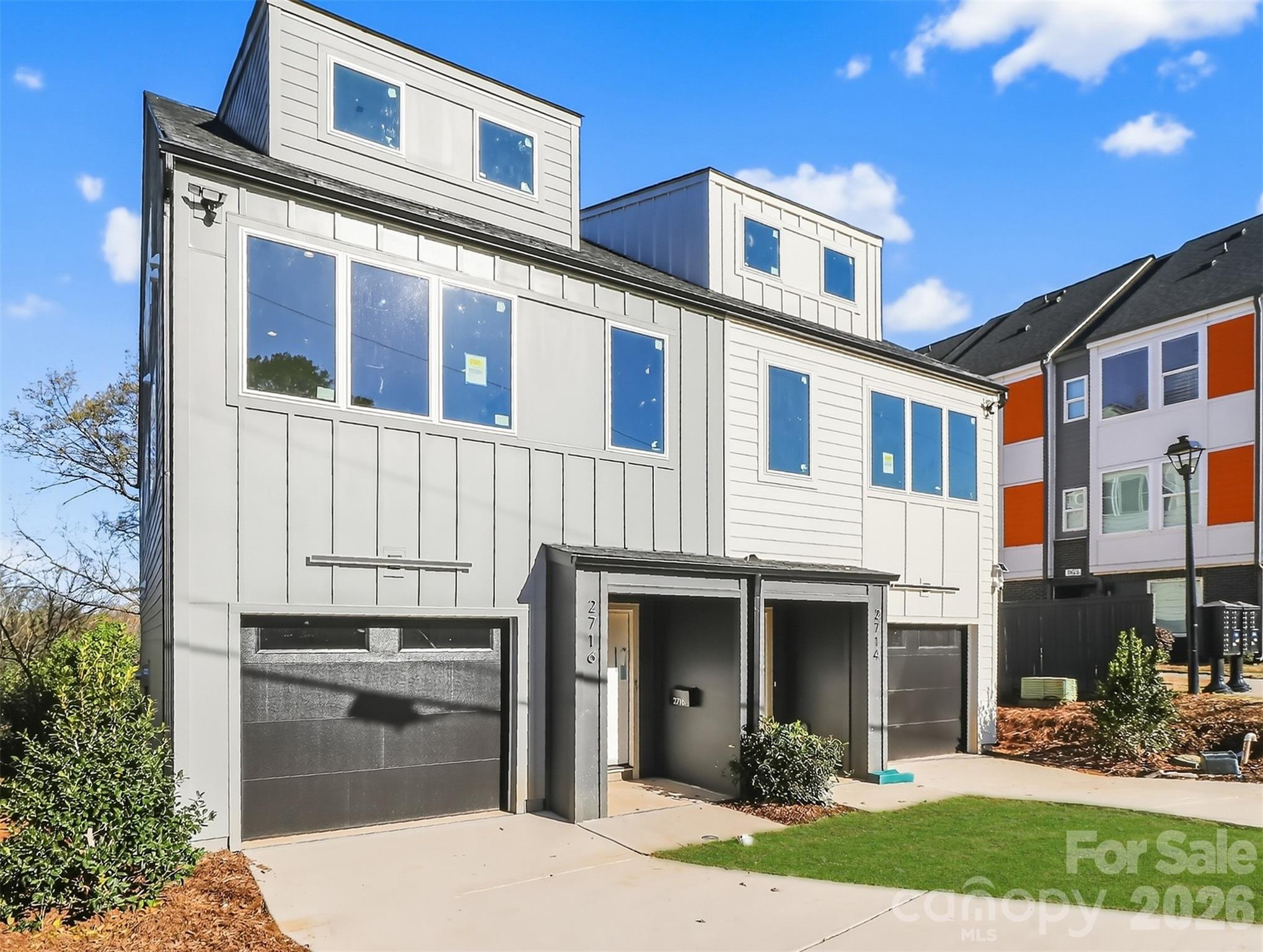 Walkability, NO HOA and the best deal in the hottest zip code! 1 of 2 opportunities to be just steps from South End dining, shopping, and nightlife. Get more room for your money in this gorgeous 3-story townhome with the perfect blend of square footage, prime location, and exceptional appreciation potential.Boasting over 2,100 sq. ft. of sun-drenched space. Featuring 3 private bedroom suites (perfect for roommates or guests), this home stands out with quartz countertops, a massive 39' tandem garage, double laundry rooms, and a private fenced backyard. 0.5 miles to the Light Rail & Rail Trail.