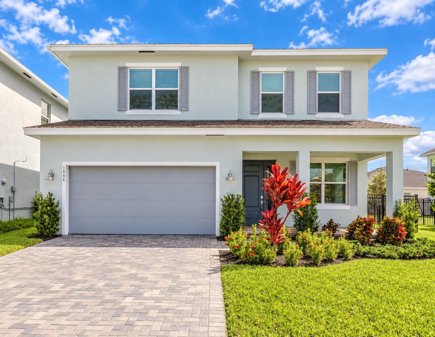 Experience resort-style living in the highly sought-after Arden community! This beautifully maintained, nearly new 4-bedroom, 3.5-bath residence offers a spacious two-story design with a bright, open-concept layout ideal for everyday living and entertaining. The main level features a private primary suite, while three additional bedrooms upstairs provide plenty of space for family, guests or a home office. Impact glass and modern finishes add comfort, style and peace of mind.What truly sets this home apart is the Arden lifestyle. Set within a spectacular master-planned community centered around Lake Arden and its unique Agrihood, residents enjoy The Barn and community farm, where fresh produce is grown and harvested, along with resort-style pools, fitness center, clubhouse, playgrounds, sports courts and fields, scenic trails, fishing, kayaking and paddleboarding. Here, home is more than four walls—it's an active, connected lifestyle surrounded by nature, recreation and community. Come experience what makes Arden one of Palm Beach County's most distinctive places to call home!One or more photo(s) was virtually staged.