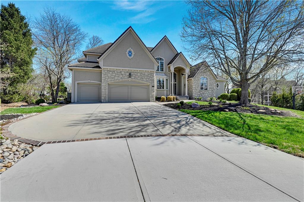Gorgeous Custom Built Masterpiece on Extensively Landscaped Cul-de-Sac Lot! Lofty 2 Story Entry with Curved Staircase, All New Carpet on Main Level and Staircase. Elegant Dining Room, 1st Floor Office with Built-Ins & Large Great Room with Fireplace & Wall of Windows! Beautiful Kitchen Boasts Large Island, Walk-In Pantry & Tons of Built-ins & Storage. Cozy Hearth Room with Amazing Masonry Fireplace and Breakfast RM Area. Spacious Owners Suite with Brand New Hardwood Flooring Plus Sitting RM Area & Large Primary Bathroom/ Closet. Functional Floor Plan Filled with "Extras" like an Upstairs Loft & Large Secondary Bedrooms All with Huge Closets. Finished Walkout LL Features 3rd Fireplace, Handsome Huge Bar/ 2nd Kitchen, Rec Room Area, Media Room Area, Billiards Area, Tiled Sunroom Area in Addition to a 5th Bedroom Plus a Full Bath AND a Half Bath! Large Unfinished Storage Space Also. Lower Level is Perfect for a Separate Apartment Space for Extended Family Members, Adult Children, OR an Amazing Family and Entertaining Space! Cedar Creek is a Lifestyle Neighborhood with Amenities to Include a 65-acre Fishing, Sailing/ Canoe / Kayak Lake, Dock Access for Small Boats, 2 Swimming Pools, Two Story Clubhouse w/ Indoor Basketball/Volleyball....and Pickleball Too! Lighted Outdoor Tennis Courts, Parks, Play Areas and Walking Trails PLUS Option to Join the Exclusive Shadow Glen Golf Course! Meticulously Maintained with Spectacular grounds (featured previously in KC Homes & Style magazine).