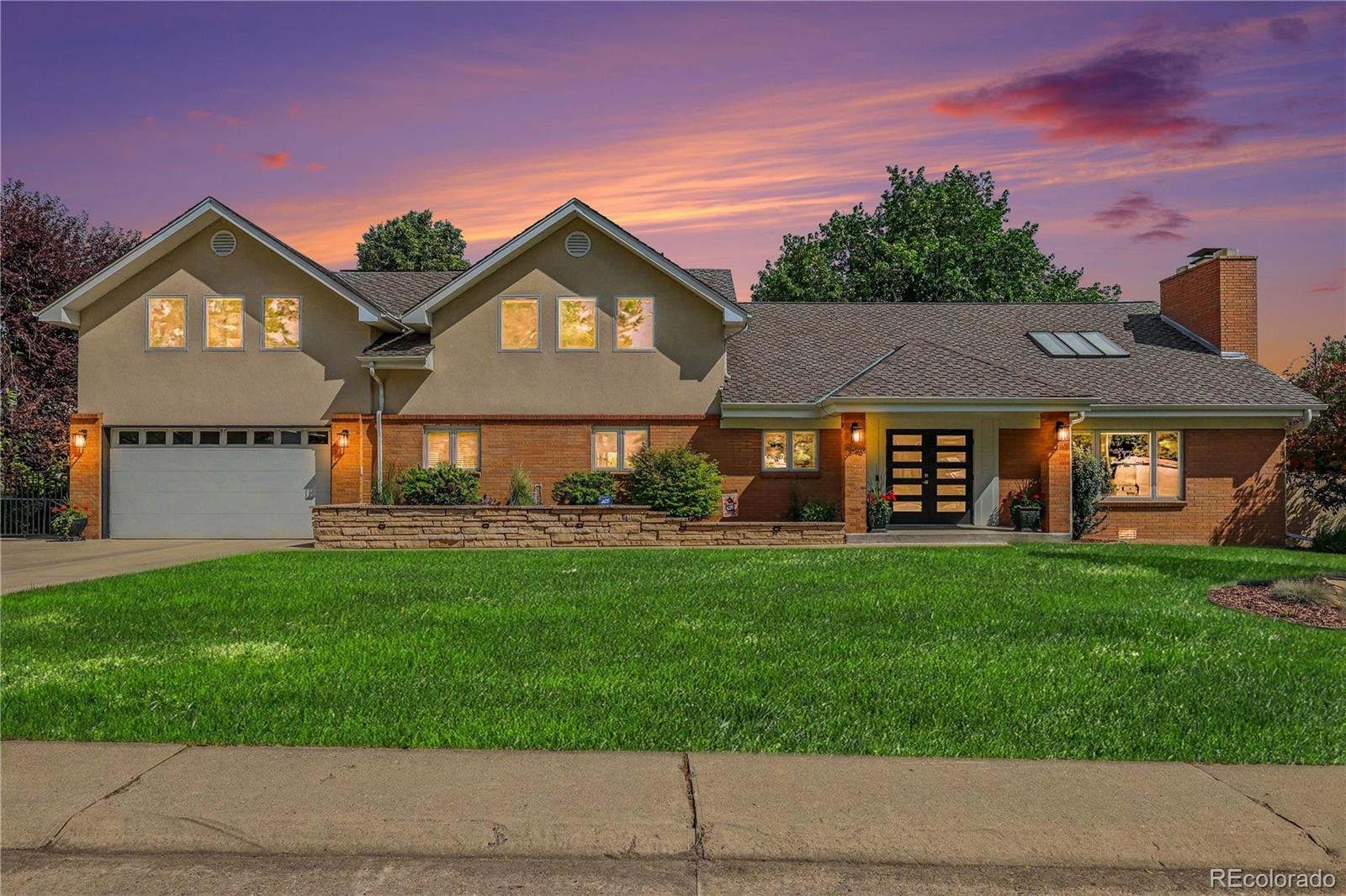 Rare private lakefront on Wolcott Lake—walk from your backyard to your OWN private dock, no street or park to cross. A fully renovated, turnkey showpiece in an unbeatable Denver location.Step outside to a private resort: a 1,300 SqFt stamped-concrete patio with built-in grill, smoker & granite bar, a gas fire pit, retractable awning, and lush, fully irrigated grounds behind a fenced, gated yard. Two upper-level decks capture sweeping lake views.Inside, the chef's kitchen dazzles with a 48" Sub-Zero, Viking gas cooktop, GE Monogram ovens & Marvel wine fridge. Custom cabinetry, oak hardwood floors, solid-wood glass doors, a spa-like jacuzzi bath, central vacuum, and a surround-sound media room elevate every space—over 3,400 SqFt above grade plus a finished lower-level flex/workout room and abundant storage.Smart & efficient throughout: OWNED solar with Tesla Powerwall, an EV-ready finished 220V garage with workbench & shop, radon mitigation, Velux solar skylights, and hardwired security.Beyond your own shoreline, optional Lakeridge Association membership—no mandatory HOA—opens a true lake community: a half-mile path around Wolcott Lake, swim beach, pavilion, playground, tennis & basketball courts, fishing, wildlife viewing, and a beloved annual picnic.All just minutes to Downtown Denver and Cherry Creek's shopping & dining, with quick access to the foothills, Red Rocks, Sheridan Blvd., US-285 & light rail. A quiet, low-traffic street and one-of-a-kind lakefront setting make this unlike anything else on the market. Don't miss it.No HOA (voluntary fee only) and a quiet, low-traffic street make this one-of-a-kind lakefront retreat unlike anything else on the market. Don't miss it.