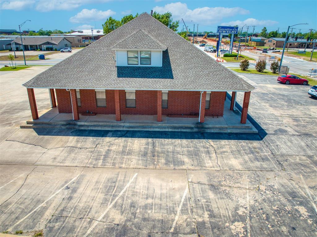 Established landmark office building with long term  anchor tenants.  High traffic hard corner with new underpass in the works.  Rents are at pre-covid rates.  4 separate suites, 2 up and 2 down.  One suite upstairs has 7  units.  There are 4 closets upstairs with appx 600 ft of storage space that is not included in office space..  Restrooms are downstairs.    Plenty of parking.  Listing Realtor is an owner of this real estate.