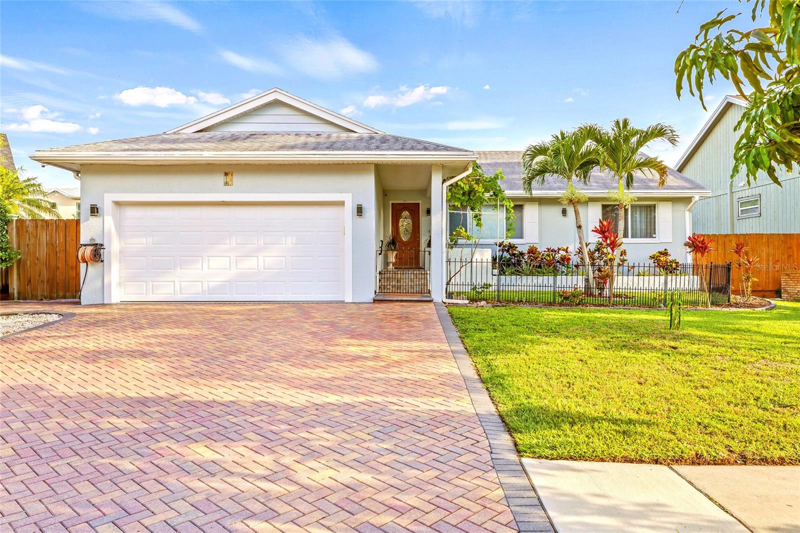 ***OPEN HOUSE, SUNDAY 14TH ,11-3:00 PM ***
LOCATION AT IT'S BEST, NEAR TO GOLF COURSE AND ZONED FOR THE BEST RATED SCHOOLS IN PINELLAS COUNTY.NEVER DAMAGED OR FLOODED BY RECENT HURRICANES, SOLID BLOCK HOME WITH HEATED & SALT POOL IS LOCATED IN THE MOST DESIRABLE PINE LAKE NEIGHBORHOOD & BAYWOOD VILLAGE, GOLF COMMUNITY WITH NO HOA FEES.
Welcome to this magnificent, immaculate, FULLY UPDATED, with the highest & best quality 4 Beds/ 2 baths/ 2 car garages modern home ! Upon your private front porch surrounded by fruit trees, mango, grapes vine & mature landscaping in the front relaxing courtyard. As you enter, you will notice the finest interior features, including the porcelain tiles through the entire house, vaulted ceilings, modern light fixtures, crown molding with the accent natural stone wall, built on electric fireplace that is movable. A superior Chief's Signature Pearl Kitchen offers granite countertops, modern glass backsplash, plenty of cabinets with soft close drawers, SS appliances, stylish range hood, conventional oven & microwave built in. The oversized kitchen & dining room with a big sitting ISLAND with rack wine, serves as a breakfast bar and creates a long linear open floor plan that leads through the door into the paradise vinyl fenced backyard.
This Home features a primary bedroom with ensuite bath, vaulted ceilings and fully luxury ensuite bathroom. 2 split bedrooms have a big closet and the fourth bedroom you can use as an office or guest room. THE UPGRADES ARE ENDLESS, NEW HVAC (2024), ROOF (2018), WATER HEATER (2020), NEW PAINT INTERIOR/ EXTERIOR, NEW HEAT SALT POOL PUMP & SOLAR COVER. NEW ELECTRICAL, PLUMBING, ATTIC INSULATION, RECESSED LIGHTS, BLINDS & SHADES, NEW IMPACT WINDOWS, WATER SOFTENER. The garage has many cabinets built in and is customized with plenty of storages you can park your golf card and much more. LAUNDRY ROOM WITH FRONT LOAD WASHER AND DRYER / PEDESTALS is built with cabinets and storages. Designed to optimize the neutral light, the residence illuminates warmth and provides the ultimate space for entertaining indoors and out with a gorgeous deck built in/outdoor BBQ Grill and mini fridge. Enjoy the spacious screened pool and different sitting patios with pavers all way, low maintenance yard work, this house brings it all, wonderful location, centrally located, close to shopping, dining, marinas, and our wonderful beaches and a short drive to: Safety Harbor, Clearwater, Dunedin, Tarpon & Pinellas bike trail. Home homeowner insurance is around $ 2600/ year. Golf card community and HOA are optional, $60 /year. Schedule a showing of this stunning house today and maybe you will be able to call it home soon!!