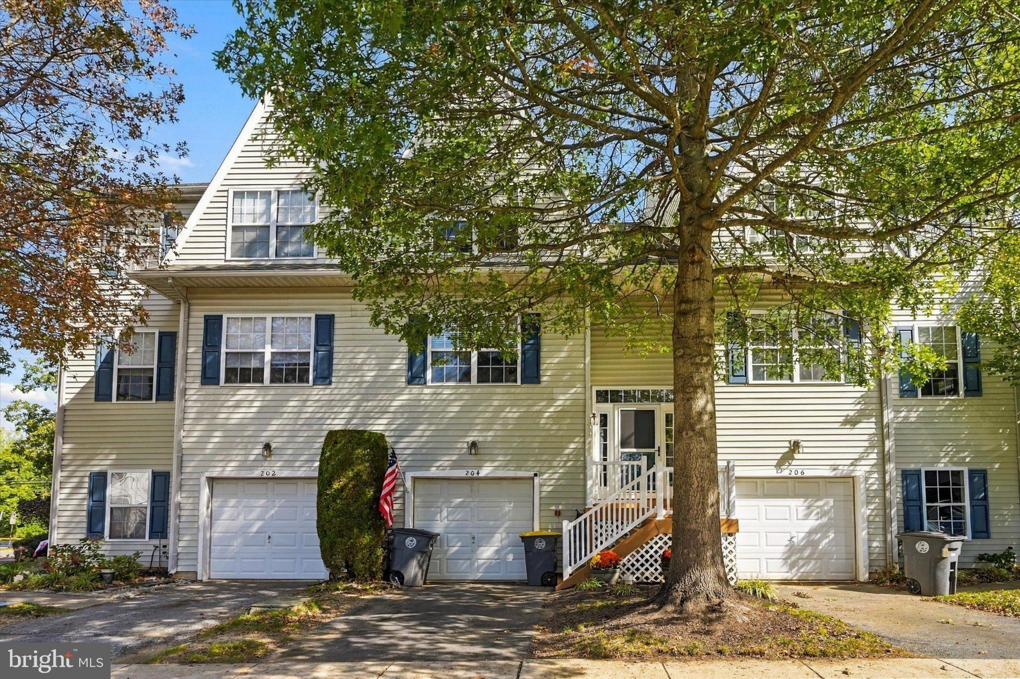 Move right in and enjoy the charm and convenience of Downingtown Borough! Welcome to 204 Cherry Street, an inviting townhome in Main Street Village featuring fresh neutral paint, bright living spaces, and a versatile layout with room to spread out. The main living area feels warm and welcoming, with a cozy fireplace creating the perfect setting for crisp fall evenings, quiet nights at home, or gathering with guests. Recessed lighting, white trim, and wood-look plank flooring complement the neutral finishes, while sliding glass doors fill the space with natural light and offer easy access outdoors. The kitchen provides ample cabinetry and workspace with an adjoining dining area passthrough that makes everyday meals and entertaining a breeze. Upstairs, comfortable bedrooms offer generous windows and ceiling fans, while the primary suite features a walk-in closet and private full bathroom. An additional full bathroom and convenient second-floor laundry make daily routines that much easier. The finished lower level adds valuable living space for a recreation room, home office, workout area, or movie nights, with sliding glass doors leading to the backyard. An attached one-car garage completes this move-in-ready home. Beyond your front door, enjoy everything that makes Downingtown Borough such a wonderful place to call home—from local restaurants, coffee shops, and shopping to community events, afternoons at Kerr Park, and time outdoors exploring the area’s scenic trails. Convenient access to the Downingtown train station and major commuter routes keeps you connected while allowing you to enjoy the character and community feel of borough living. With inviting spaces, everyday conveniences, and a location that brings it all together, 204 Cherry Street is ready to welcome you home!