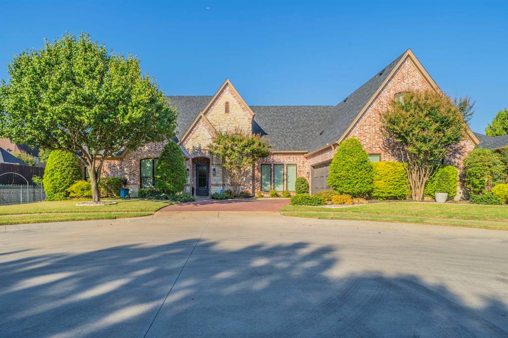 TOTALLY TURN KEY!  This gorgeous low-maintenance home has charm, accessibility, and a very flexible floor plan. Conveniently situated between Fort Worth and Dallas, the neighborhood offers swift access to DFW Airport, as well as tons of shopping and restaurant choices.   Custom construction by the builder for his personal home, it was created with many upgrades and high quality features. The incredibly well maintained and updated home is situated at the end of a cul-de-sac with a charming canal view from the sizable covered patio.  Dream kitchen boasts a gas range, large island, breakfast bar, updated custom cabinets, statement lighting, and a well-appointed pantry.  Expansive Primary Suite features sitting area ensuite bath with walk-in shower and custom walk-in closet. Third bedroom or bonus room with full bath and closet is a flex space with many uses.  The study also has a full closet and could serve as a 4th bedroom. Wired for sound throughout and all doors are solid core. HOA covers both front and rear yard maintenance AND canal aeration and cleaning. Don't miss this very special property that you can make your own in a flash--TOTALLY TURN KEY!