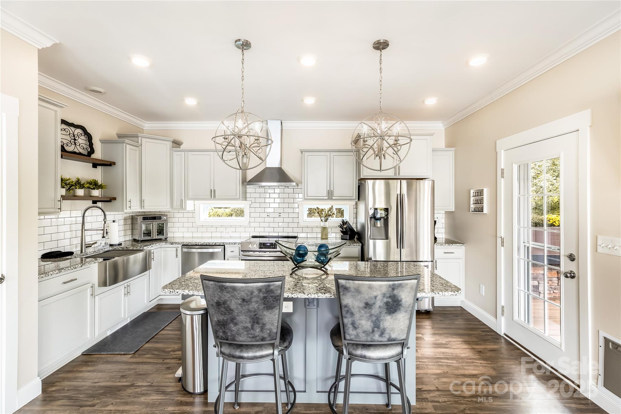 Waterfront Modular home built in 2019 with spectacular views of Badin Lake.
Open concept living & ample kitchen area that was designed for entertaining. Step outside to
the upper covered porch that is an extension of the dining area to the magnificent views
across the lake. The large master suite is located on the main level with a spacious walk-in
closet that houses the washer and dryer. The large en-suite bath offers a spa like large
tile shower with overhead rainfall shower head and a double vanity sink. The downstairs will
WOW you with a custom bar and living/entertainment area. A large secondary bedroom
with a bath that also features a custom tile shower and dual vanity. The lower patio has been
designed as another extension for entertainment with a feature wall perfect for an
outdoor television. It is also a fabulous spot to grill, play cornhole or just sit and enjoy the
views!!