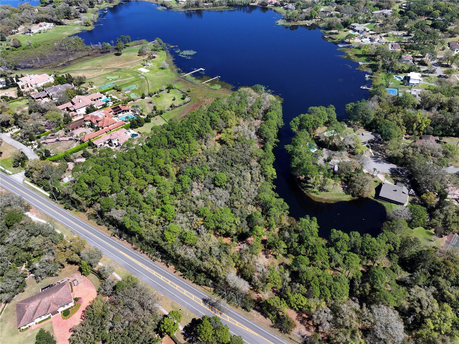 Prime Lakefront Vacant Lot just under 10 (MOL) Acres in the Markham Woods Corridor-Two Parcels Being Sold Together
Discover a rare and exceptional opportunity to own the last buildable vacant residential property off Markham Woods Road. Spanning approximately 9.53 (MOL) acres with an impressive 846 (MOL) feet of lake frontage on Rice Lake, this expansive parcel offers endless possibilities.
Located in the prestigious Markham Woods Corridor, this is your chance to create a private lakefront estate tailored to your vision. With its serene natural surroundings and convenient access to nearby amenities, this property is perfect for those seeking luxury, privacy, and tranquility.
Don't miss this once-in-a-lifetime opportunity to secure the final nearly 10-acre vacant lot in one of the most desirable areas in Central Florida.
Reach out today for more information or to schedule a private viewing.