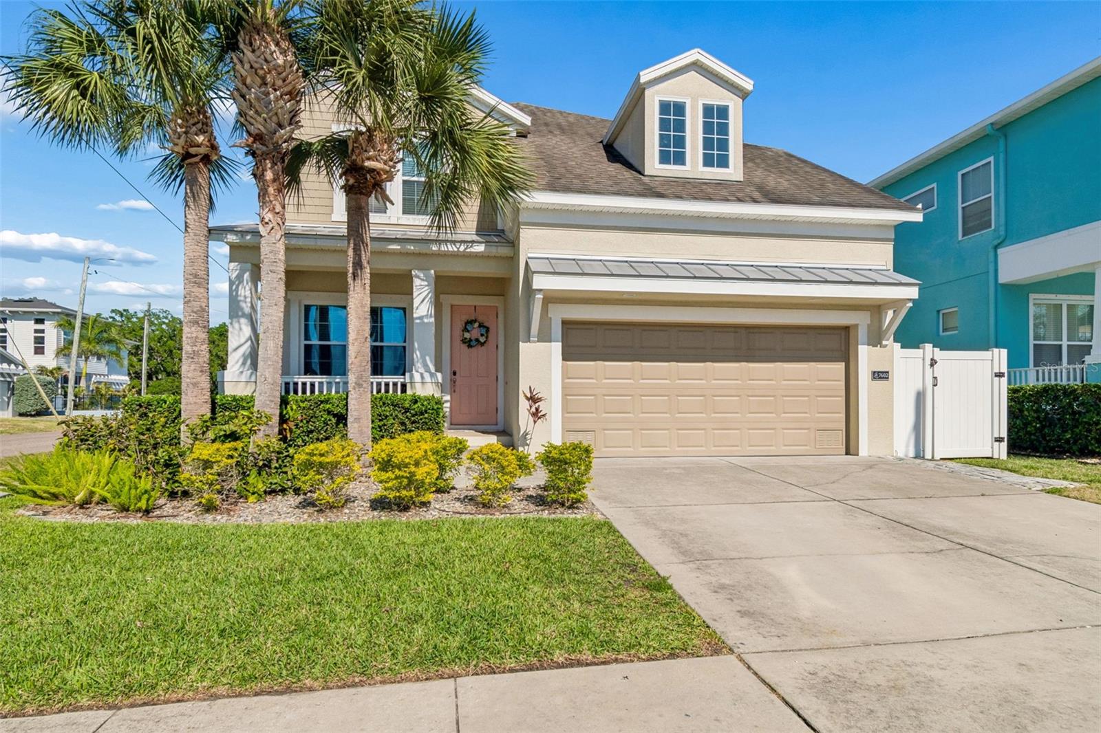 Here’s your chance to live the South Tampa lifestyle right in the heart of Port Tampa City!! The shaded covered front porch invites you into this stunning, 4 bedroom, 2.5 bath newer construction, move-in ready, Key West style pool home. The pride in ownership is apparent and has been meticulously maintained by one family and showcases many custom upgrades…be prepared to be impressed!!Upon entering, you are greeted with soaring ceilings, a freshly painted interior, and luxurious vinyl plank flooring throughout the first floor. The open-concept main level creates a seamless connection between the kitchen, dining, and living areas—delivering a layout equally suited for elevated entertaining and everyday ease.The bright and airy kitchen is adorned with upgraded solid wood soft close cabinet doors, granite counters, stainless steel appliances, a designer backsplash, oversized island and generous prep space, complete with a large walk-in pantry. A beautifully crafted custom built-in elevates the dining area with glass display cabinets, wood accent shelving, and a beverage fridge blending style and function for hosting.The comfortable family room filled with natural light creates a welcoming space for gathering and unwinding. Additional tailored cabinetry in the living room adds elevated storage and refined design detail. A flexible main-level space offers versatility as a home office, lounge, playroom, or creative studio—adapting to modern living.Up the tiered staircase, the expansive primary suite overlooks the sparkling pool and backyard retreat below. Designed as a private escape, it features a well-appointed ensuite bath with glass enclosed shower, dual vanity and a generous walk-in closet. Three additional bedrooms are thoughtfully positioned around a full bath, creating an ideal layout for family or guests. A conveniently located upstairs laundry room adds daily ease and efficiency.Enjoy your secluded resort style backyard oasis with a custom designed, saltwater pool (2019) featuring a bubbling, umbrella shaded sun shelf, dual waterfalls surrounded by tropical palms and framed by an expansive travertine paver deck perfect for al fresco dining and relaxation. A fully fenced, turfed yard delivers a clean, low-maintenance outdoor setting.Additional highlights include a two-car garage, newer Trane HVAC (2020), and the peace of mind of a home with solid block first-floor construction that has remained high and dry through prior storms, paired with a low assumable flood insurance policy.Ideally positioned just minutes from the waterfront beauty of Picnic Island Park and the iconic stretch of Bayshore Boulevard. Also convenient to MacDill Air Force Base, and the vibrant energy of both Downtown Tampa and St. Petersburg, premier shopping and dining, parks, Tampa International Airport, and Gulf beaches. This is it, the one you’ve been waiting for...Welcome Home!! Schedule your private showing today!!