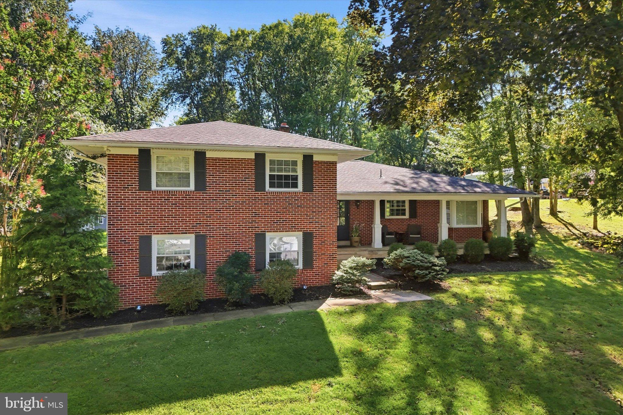 Welcome to this beautifully updated 4-bedroom, 3 full and 1 half bath home set on 1.13 acres with a large backyard and plenty of space to enjoy inside and out. Updated from top to bottom, this home offers a wonderful blend of modern finishes, spacious living areas, and thoughtful details throughout. The main level features a welcoming foyer with a large coat closet and an easy flow into the bright living and dining rooms. The dining room features two sets of French doors that open to the covered patio, complete with radiant heat, creating the perfect space to relax or entertain while enjoying multiple-season outdoor living. The updated kitchen is the heart of the home, featuring granite countertops, stainless steel appliances, a center island with a cooktop and prep sink, and a sunny breakfast area with a large bay window and built-in window seat. The kitchen opens seamlessly to the living and dining areas, making it ideal for both everyday living and entertaining. Upstairs, you'll find four spacious bedrooms, including a primary suite with two closets and an updated en-suite bath featuring a glass shower. Bedrooms two and three offer custom closet systems. The hall bath features a charming clawfoot tub with a shower combination, and new carpeting extends throughout the upper level. The lower level offers a warm and inviting family room centered around a brick fireplace with sliding doors leading to the lower patio. A beautifully appointed powder room with wainscoting, a convenient laundry room with an exterior door to the driveway, and direct access to the attached two-car garage complete this level. The finished basement provides exceptional additional living space with a large recreation room with brick flooring, and a full bath with a tiled shower. Whether you're hosting family and friends, watching the big game, or creating the ultimate play or hobby space, this level offers endless possibilities. Additional improvements include a newer roof and HVAC system. Outside, the expansive 1.13-acre lot provides plenty of room to play, garden, or simply enjoy the outdoors. The covered patio with radiant heat extends your outdoor living season and offers another inviting space to entertain or unwind. Ideally located close to downtown Media, you’ll enjoy easy access to beloved community events such as Dining Under the Stars, holiday parades, shopping, restaurants, and all that Media Borough has to offer, while also being part of an excellent school district. Beautifully updated, thoughtfully designed, and filled with exceptional indoor and outdoor living spaces, this move-in-ready home offers everything today's buyers are looking for.