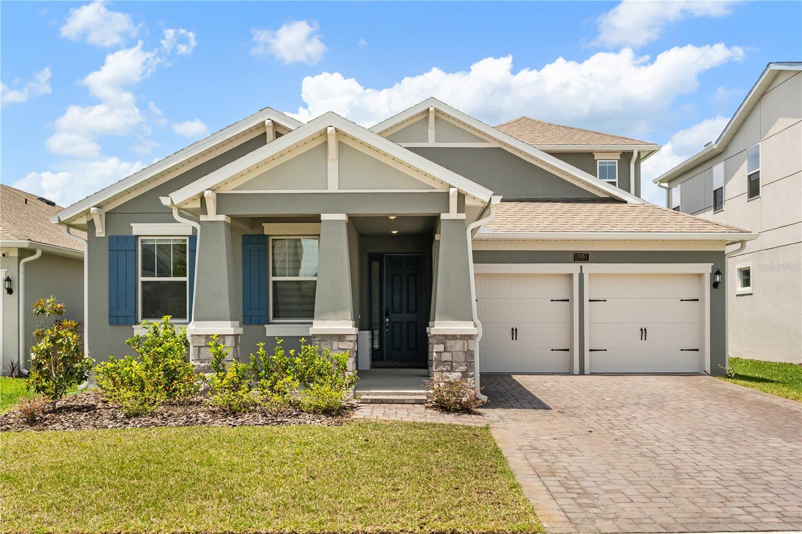 Welcome to this gorgeous, almost new, Dream Finders Anna Maria Bonus home located in one of the most desirable Lake Nona Summerdale Park Community. This luxurious and functional home spans over almost 2700 sq ft featuring 4 bedrooms, 3.5 baths along with expansive bonus room upstairs. As you enter the home through beautiful and inviting covered porch, you will walk into an open floorplan home.  The open concept kitchen and living combo provides for relaxing and entertainment space.  The Kitchen will not disappoint with a Gourmet Kitchen and large island!  Stylish white quartz countertops and beautiful gray cabinets, the kitchen provides plenty of room to cook your favorite meals or entertain.  The master suite is also conveniently located on the main floor, featuring beautiful and spacious master bath and walk-in closet.  There are two other spacious bedrooms along with a full and half bath, perfect for guests.  As you head upstairs, you are welcomed into an open entertaining space which could be used as game room, movie theater, or entertaining space.  Upstairs also features a closet and full bathroom for convivence.  Outdoor back porch and greenspace provides plenty of space to entertain, barbeque, or garden.  The house also features 2-car garage with a spacious pavered driveway, amazing open floor plan, all bedrooms on the main floor, and beautiful backyard.  Located in the heart of Lake Nona, desirable schools, easy access to shopping, dining, and entertainment, minutes to Orlando International Airport, Medical City, USTA, theme parks, beaches, and major highways for ultimate convenience.  Don’t miss this chance to own your dream home at Summerdale Park.  Schedule your private showing today!
