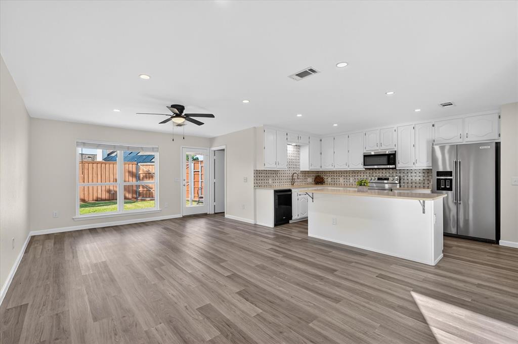 Beautifully remodeled 4-bedroom, 2-bathroom forever home in the highly sought-after Country Meadows neighborhood with NO HOA! Every square inch of this single-story residence was thoughtfully touched during a full renovation, resulting in a move-in-ready gem! Featuring new luxury vinyl plank flooring, fresh carpet, brand-new windows, water heater, updated lighting, and crisp neutral paint throughout. The open-concept Chef's kitchen boasts modern finishes and updated appliances overlooking bright, spacious living areas perfect for both daily living and entertaining. The primary suite offers a luxurious walk-in shower with natural stone countertops, while the guest bathroom has been completely upgraded. Outside, the charming German schmear brick exterior provides excellent curb appeal. The large, fully fenced backyard features a tall privacy fence with gated entry — ideal for securely parking a bass boat, camper, RV, trailer, or even storing equipment for a small business. There is ample room to add a shop or pool if desired. Just steps from Country Meadows Park and minutes from Celebration Park, Allen High School, shopping, dining, and US-75, this home offers the perfect blend of peaceful neighborhood living and convenient access to everything Allen has to offer.