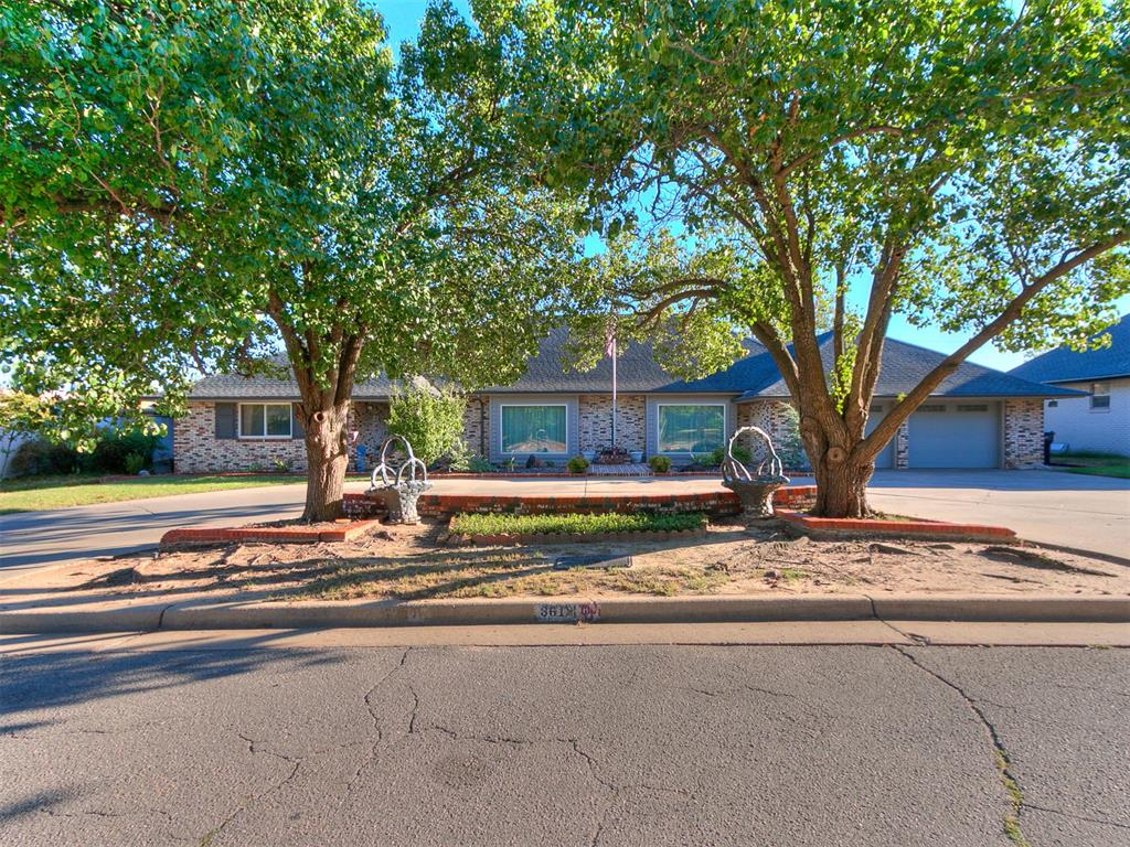 Welcome Home! This beautifully updated 1960s home is truly move-in ready and offers an exceptional blend of timeless charm, modern updates, and thoughtful amenities. Meticulously maintained and presented in pristine condition, this home is filled with quality improvements designed for comfort, convenience, and everyday living.The home features bamboo Cali flooring and new windows installed in 2019, along with a sprinkler system, security system, and a whole-home 24kW generator for added peace of mind.The heart of the home is the stunning fully remodeled kitchen, completed in 2022. Expanded to create a spacious and highly functional layout, this chef-inspired kitchen is filled with custom details and smart storage solutions. Features include soft-close cabinetry, a dedicated KitchenAid mixer cabinet, a cleverly concealed coffee bar, an elevated under-sink storage system with a convenient drawer below, and built-in drawer dividers for effortless organization. The beautiful refrigerator remains with the home.The primary suite offers a private retreat, with a beautifully remodeled bath featuring its own tankless water heater, built-in dressers, linen storage, an updated shower, luxurious soaking tub, and heated floors—perfect for adding a little extra comfort to your daily routine.The garage is another exceptional feature of this home and offers amenities you don't often find together. It includes an in-ground storm shelter, new garage doors and openers with keypads, a new attic ladder, and an automatic attic lift, making it incredibly easy to store and retrieve those items you don't use every day.From the thoughtful kitchen design to the upgraded primary bath, whole-home generator, exceptional garage features, and beautifully maintained outdoor spaces, this home has been lovingly updated with both style and functionality in mind.Come see for yourself all that this exceptional property has to offer. This one is truly ready to welcome you HOME!