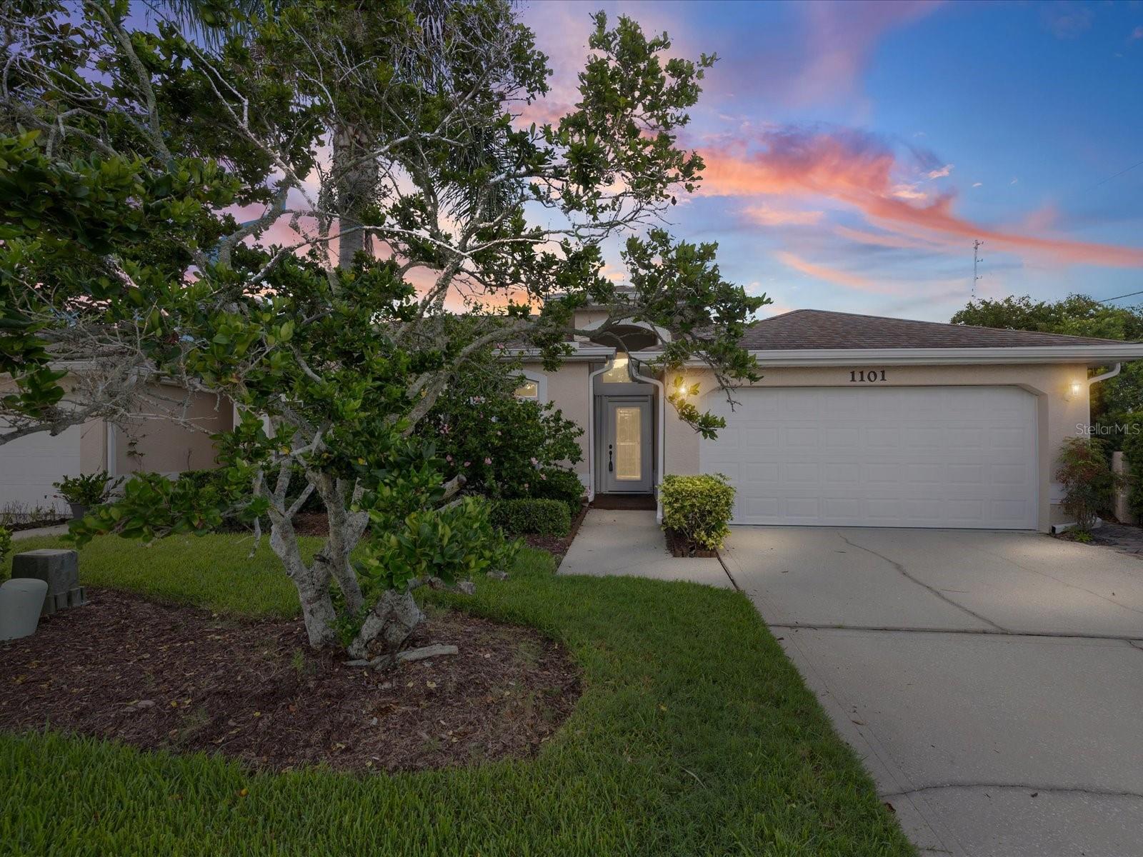 Welcome to this beautifully maintained, move-in-ready 3 bedroom, 2 bath home offering 2,036 square feet of comfortable living space in desirable Dunedin.  From the moment you arrive, you'll appreciate the inviting curb appeal, mature landscaping, and the many thoughtful updates throughout.  Inside, the spacious open-concept layout features a desirable split bedroom floor plan designed for both everyday living an entertaining.  The updated kitchen offers an abundance of cabinetry, beautiful quartz countertops, stainless steel appliances, a pantry, and convenient access to the separate walk-in laundry room.  Updated bathrooms and newer flooring create a fresh, modern feel with minimal maintenance.Hurricane windows and slider throughout the home provide added peace of mind, energy efficiency, and a quieter, more peaceful interior. The spacious living areas are filled with natural light and offer plenty of room to gather with family and friends.  Step outside to your own private retreat featuring a beautiful paver patio surrounded by lush, established landscaping-the perfect setting for morning coffee, al fresco dining, or relaxing and entertaining in the Florida sunshine.  The two car garage provides excellent storage and everyday convenience.  Additional highlights include the roof (2016), HVAC (2017),  and NO FLOOD ZONE.  The HOA provides added convenience by covering exterior lawn care, pest control, roofs and painting.  The clubhouse has a variety of activities, a library, space to host events, and a heated pool and spa.  Ideally located near downtown Dunedin, gorgeous Gulf beaches, parks, restaurants, shopping, and the Pinellas trail, this home offers the perfect combination of comfort, convenience, and the laid back Dunedin lifestyle.