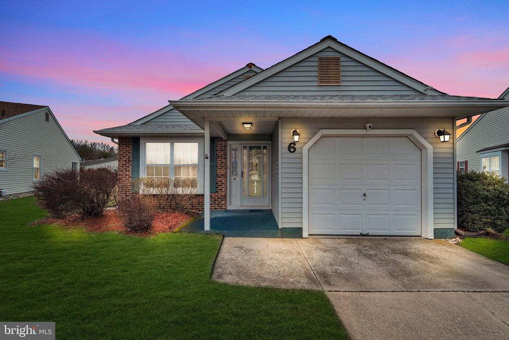 No stairs!  Clean and Pretty Hamilton model in sought-after Holiday Village!  Plenty of upgrades including ROOF (2022), FURNACE (2025), HWH (2025), Range and Refrigerator (2020), Washer/Dryer (2025).  Fresh paint and newer plank floors make a beautiful and bright space.