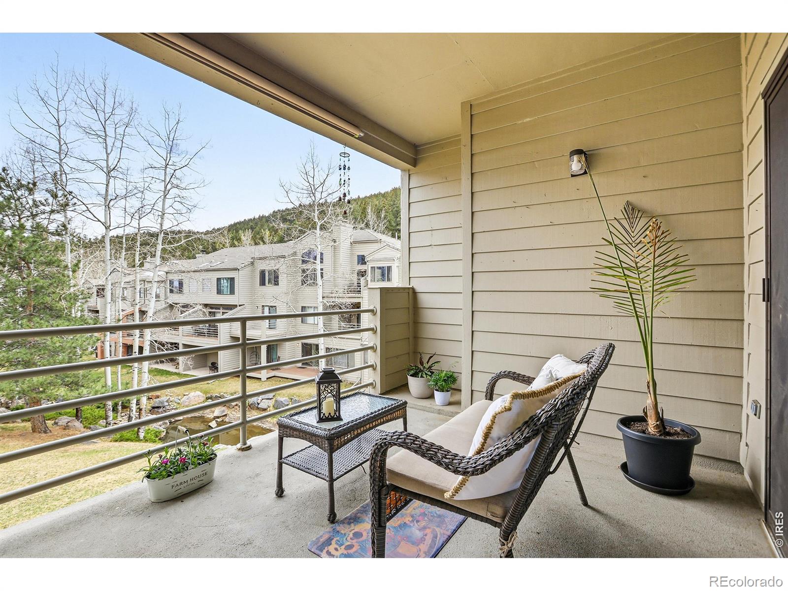 Move in Ready! HOA DUES INCLUDE EXTERIOR INSURANCE! Welcome to Chimney Creek Condos, ideally located in the foothills just off I-70, offering quick access to both the mountains and the city of Denver. This 3-bedroom or 2 bedroom with a dedicated office/den features easy, low-maintenance, one-level living with no interior stairs. Enjoy direct street-level front door access, plus entry from your private 2 car garage - step down just one step and you're home, brand new carpet - move in ready! The location is unbeatable, just minutes to Red Rocks Amphitheatre, Evergreen, and Three Sisters hiking trails, with Genesee Mountain trails right across the driveway. Spend your days outdoors and your evenings enjoying Denver's dining, nightlife, and arts scene - all within a convenient drive. Enjoy peaceful, uninterrupted views overlooking Chimney Creek from two private balconies, including a new Trex deck. Wildlife sightings of elk, deer, and wild turkeys add to the natural setting. New Andersen windows and patio doors enhance the home. Community amenities include a clubhouse, swimming pool, and newly updated tennis and pickleball courts. Pre-listing home inspection completed and a comprehensive 1 year home warranty included - providing exceptional peace of mind for the new owner. A rare combination of location, convenience, and lifestyle - this is a must-see. Pre-Listing Inspection Report is available. A True Lock and Leave Mountain Retreat! Comes with a 12 Month Home Warranty and Pre-Listing Inspection!