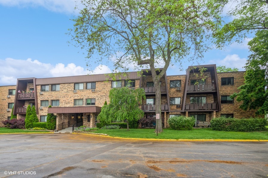 Motivated Sellers for the right price! Great opportunity to live in the very desirable Arlington Heights and the even more desirable Buffalo Grove High School. Enjoy a summer Walk to Lake Arlington or jump on a bike, boat or fish. Large 2 bedroom, 2 full bath condo in a great location. The Primary is very spacious, and the 2nd Bedroom is also above average in size with new closet doors. Huge living room, dining room and good size kitchen. Newer windows and sliding patio door that leads to a large balcony with northern view. Newer A/C. Storage and laundry on the same floor. Enjoy the meticulously maintained pool. The assessment includes heat, water, pool, and more. Priced right, easy to show. Come and see it, you will not be disappointed. Multiple units sold extremely fast in this complex and this is priced accordingly to these comps.....Comps 220k-245k