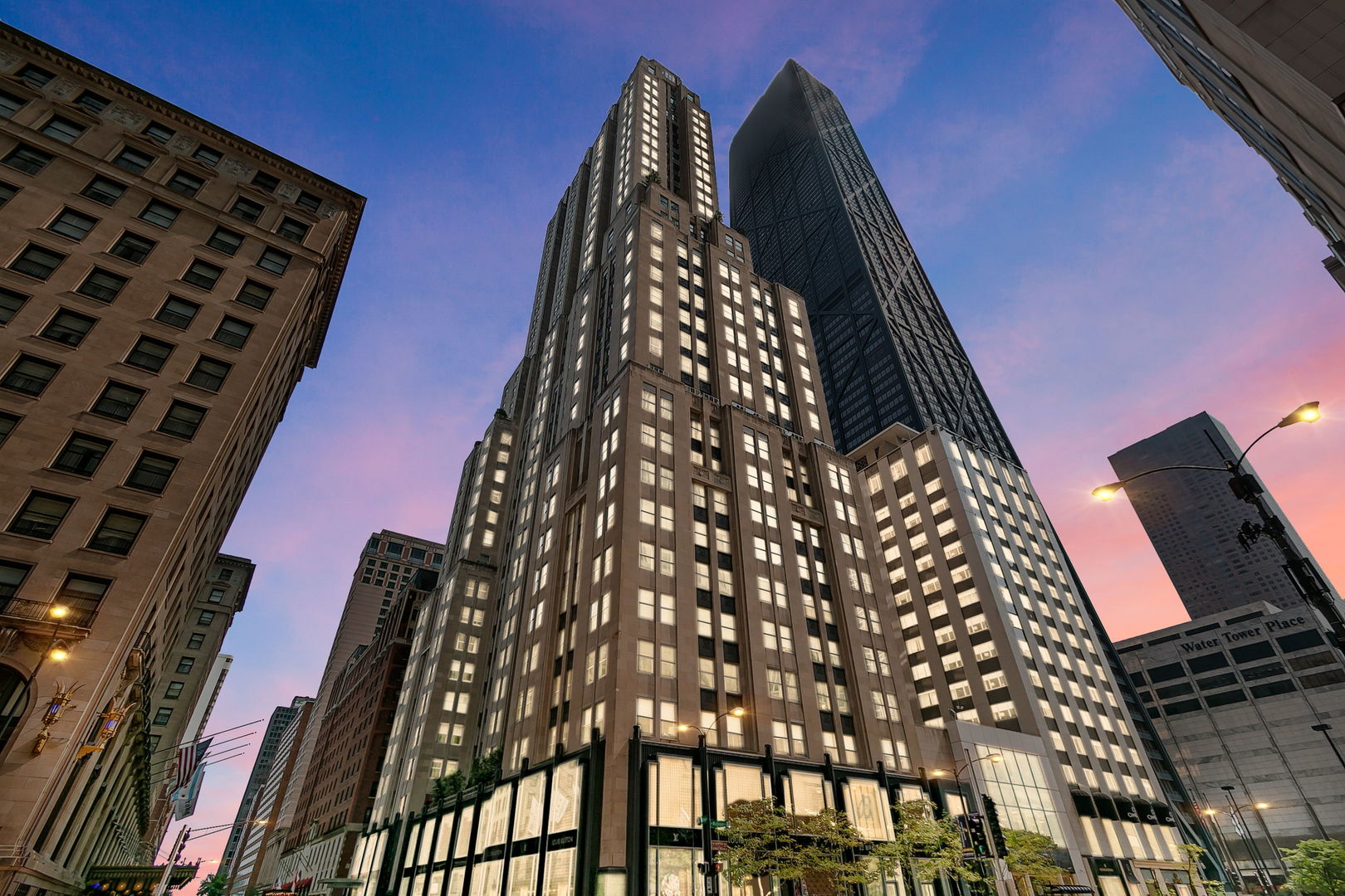 Welcome to 11F at The Palmolive! This split 2 bedroom 2 and 1/2 bathroom luxurious residence expanding nearly 2400 square feet is exceptional. Situated in the desirable southwest corner of the building; views can be seen along Michigan Ave, and once entering the unit one can see the beauty in the details of hand selected materials and quality craftsmanship. The clean lines and walls of windows bathe this home in natural light from every direction. To bring the outdoors in this residence is only one of 4 with private mini terraces for planter boxes to provide a sense of tranquilness that one can only dream of with city living. A wonderful expansive eat-in kitchen with an enormous island outfitted with chef's appliances complements the flexibility of small gatherings or private parties. You will not want to miss the glamorous and alluring world once you step into this magnificent reimagined warm and inviting space! All this within the exclusive and world-renowned Palmolive building with 24 hour door service, valet parking and a host of other amenities. 1 parking space included in the price! New York meets Paris meets Chicago all channeled in one elegant and outstanding residence for the most discerning.