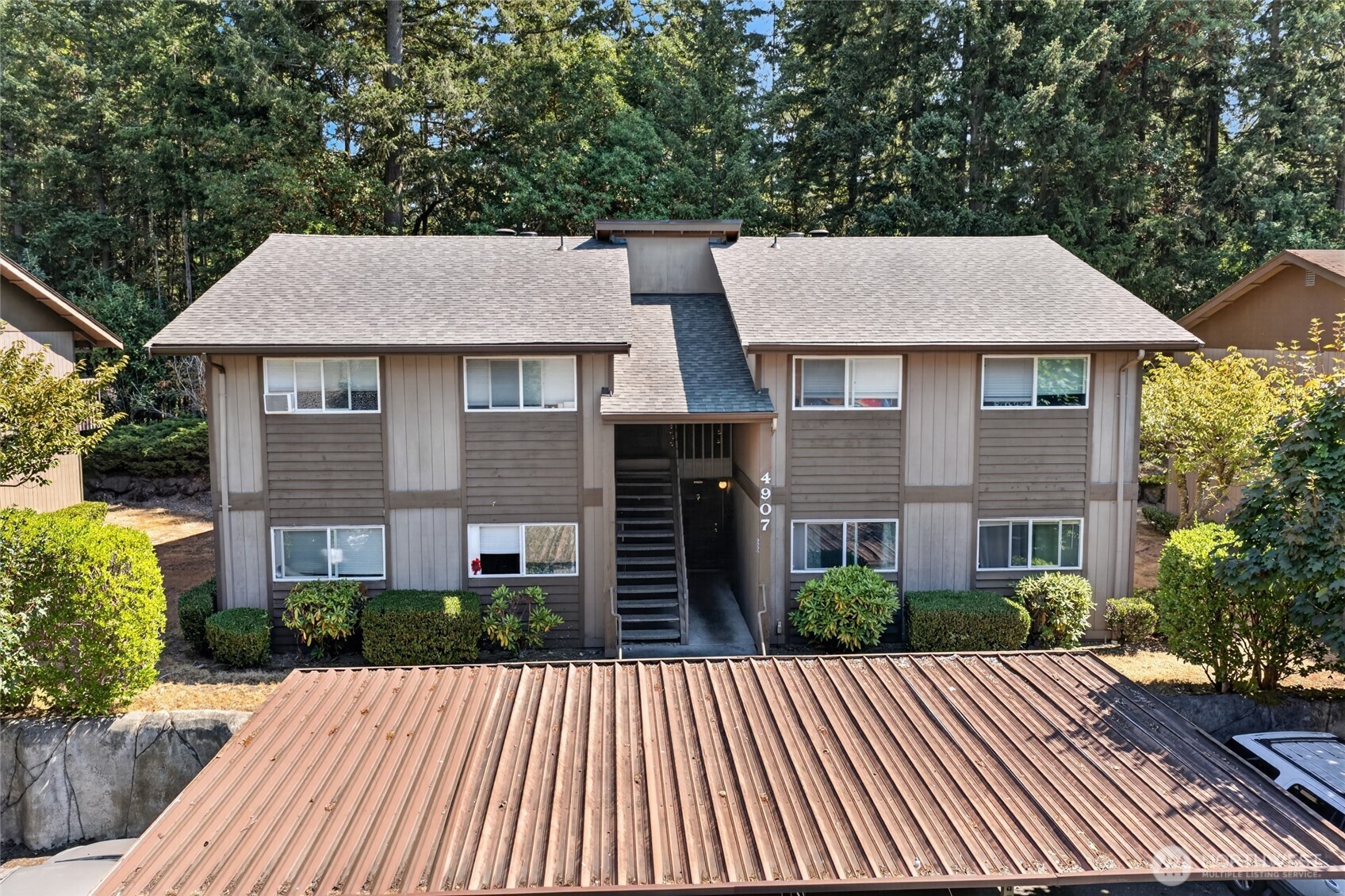 * SOLID, LOW MAINTENANCE INVESTMENT OPPORTUNITY * The fourplexes in the Orchard Park Apt community are rarely available, last sale was 2021. This is perfect if you're looking for your first rental property or want to expand your current portfolio by four doors! This apt community is located just south of Fircrest & east of University Place. It features four spacious 2-bed, 1-bath units, each with full w/d, fireplace + carport parking, a leasing advantage in this corridor. Unit C fully updated 2024. Both upper units have balconies, lower units enjoy patio space. New $20k roof. Lease renewals could provide the opening to implement RUBS to recapture w/s/g exp. One unit is expected to vacate 09/30 giving house hackers the chance to occupy one while the other 3 pay your mortgage. Great access to I-5, SR-16 & neighborhood services. For commuters to JBLM or going north to King County, the area provides major transportation options. Whether you're a seasoned investor looking to increase rents & build long-term equity or an owner-occupant seeking a smart house-hack, this property offers multiple paths to maximize your investment & deserves your serious consideration. The chance to acquire a well-maintained 4plex with potential upside or owner-occupant flexibility are increasingly difficult to find in today's Puget Sound market. HOA covers garbage & landscaping. Clean records, easy to self-manage. Seller's exit is your gain. Buyer to verify measurements, rents & financing eligibility.
