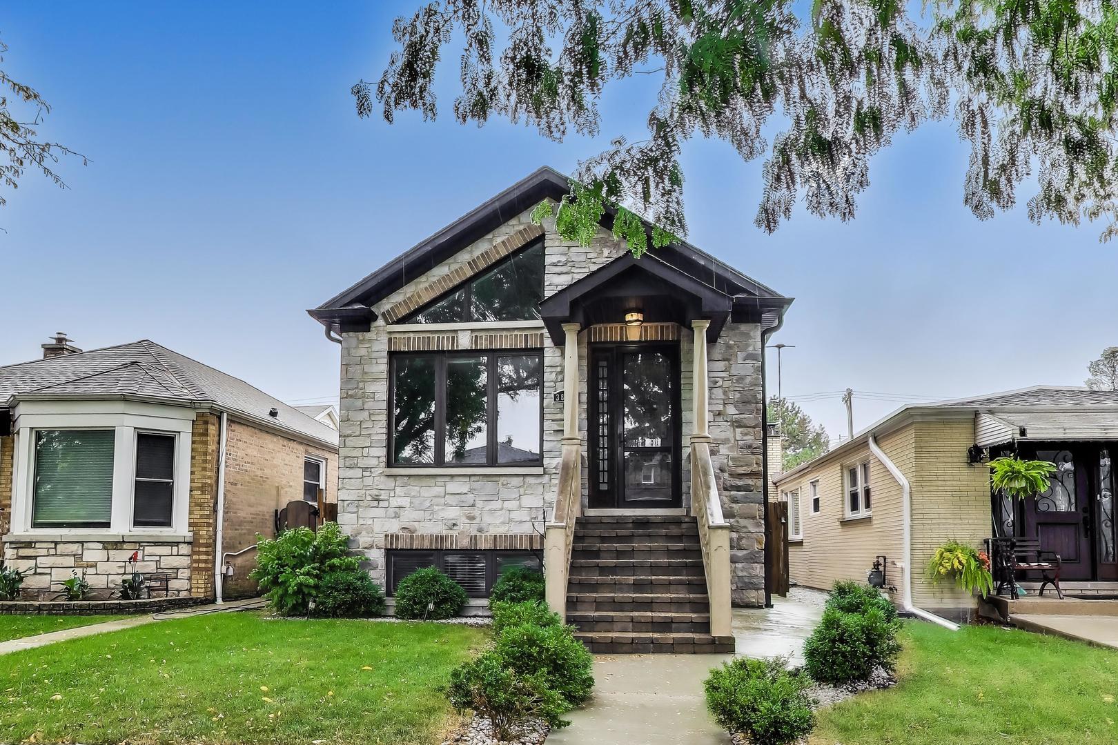 Built in 2018, this solid masonry natural stone & brick raised ranch has everything you need! Great space 5bed/3bath home features main floor open layout with cathedral ceiling in Liv Rm, Din Rm and Kit w/can lights, 2 bedrooms, full bath and master suite w/walk-in closet and private master bath. Kitchen has white shaker style 42" white cabinets with gray quartz countertops and black stainless steel appliances. The full finished basement provides family room with built in bar, 2 bedrooms, full bath, laundry and utility room. Modern finishes, extensive trim work. Oversized 2 car garage, patio, fenced yard. This is a great place to call home!! Show today