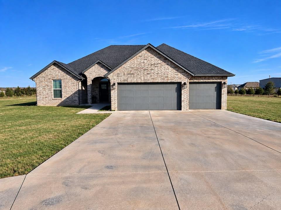 Beautifully maintained single-story home offering four bedrooms, two bathrooms, an open-concept layout, and a three-car attached garage. The spacious kitchen features granite countertops, a large center island, abundant cabinetry, and an open connection to the main living and dining areas. The living area features a fireplace, raised ceiling, and plenty of natural light. The private primary suite includes a large walk-in closet and en-suite bath with double vanities, tiled shower, and separate soaking tub. Three additional bedrooms provide flexibility for guests, workspace, hobbies, or additional living needs. Exterior features include a covered rear patio, covered front entry, expansive lawn, full-property sprinkler system, complete gutters, and generous driveway and garage parking. The home has been lightly lived in and is move-in ready, with a clean, well-maintained interior and plenty of outdoor space. Seller welcomes qualified offers.
