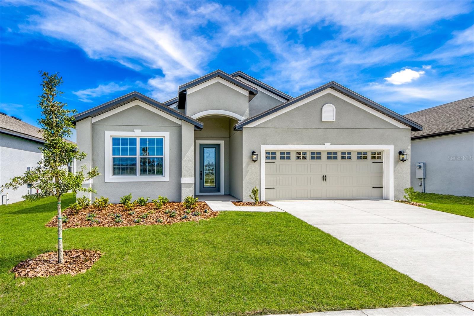 Pre-Construction. To be built. Step into the Lantana, a beautiful 4-bedroom, 2-bathroom home designed with open-concept living and everyday comfort in mind. From the moment you enter the welcoming foyer, you’re greeted by a bright, airy layout that connects the family room, dining area, and modern kitchen—perfect for both entertaining and relaxing. The kitchen features granite countertops, stainless steel Whirlpool appliances, a spacious island with a breakfast bar, and white wood cabinets that bring a clean, timeless feel.The private master suite is tucked away for peace and quiet, complete with a large walk-in closet and a luxurious bathroom featuring dual sinks and a garden tub. Each additional bedroom offers its own closet and plenty of space. Luxury vinyl flooring enhances the main living areas, while soft carpet adds comfort to the bedrooms. A covered front porch and professional landscaping complete the home’s inviting exterior.Located in Gum Lake Preserve, a serene lakeside community, residents enjoy access to Gum Lake for fishing, kayaking, and boating, plus a boat ramp, future fishing dock, playground, picnic areas, and nature trails. Ideally situated just minutes from I-4 and conveniently located between Tampa and Orlando, this community offers both peaceful living and city accessibility.Don’t wait—experience lakeside living at its finest. Schedule your tour today!