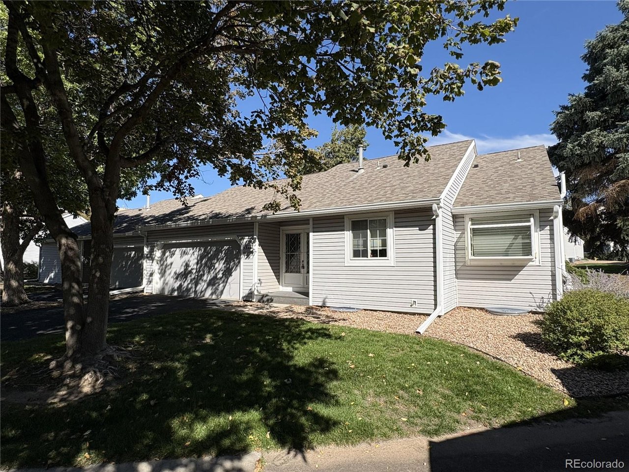 Seller offering up to $10,000 in concessions toward buyer closing costs, interest-rate buydown, hardwood floors etc. Back on Market due to Buyers failure to perform. Move in Ready!! Tucked into a scenic setting directly across from Cherry Creek State Park, this beautifully updated home blends comfort, style, and functionality with peaceful pond views and thoughtful upgrades throughout. This home has one of the largest floor plans in Heather Gardens and one of the few with a finished basement. The bright, open living room features vaulted ceilings and a cozy fireplace with an electric insert-perfect for relaxing or entertaining. The kitchen has a touch-activated faucet, and additional cabinets.The primary suite is a true retreat overlooking the pond with fountain and open space. It includes a walk-in closet and a fully customized bathroom featuring heated floor and shower bench, zero-entry shower, custom counter and cabinets, bidet, and motion-sensor lighting. The secondary bedroom features a charming bay window with a view of the pond, while the third bedroom has been adapted with an elevated Bosch washer and vent less dryer setup for added functionality. The finished basement expands your living space with a large open recreation area, a wet bar, a fourth (non-conforming) bedroom with a separate storage room featuring built-in shelving, and a 3/4 bathroom. Ideal for guests or entertaining. A separate utility and laundry room include a workbench, water softener, and shelving. Additional highlights include a garage with built-in cabinets and sealed flooring. Motion-sensor lighting in the front and back adds a level of ease and efficiency. New sump pump, radon system installed, carpets cleaned, furnace & AC serviced and cleaned.  All appliances and Fidelity National Comp Plus Plan Warranty included.