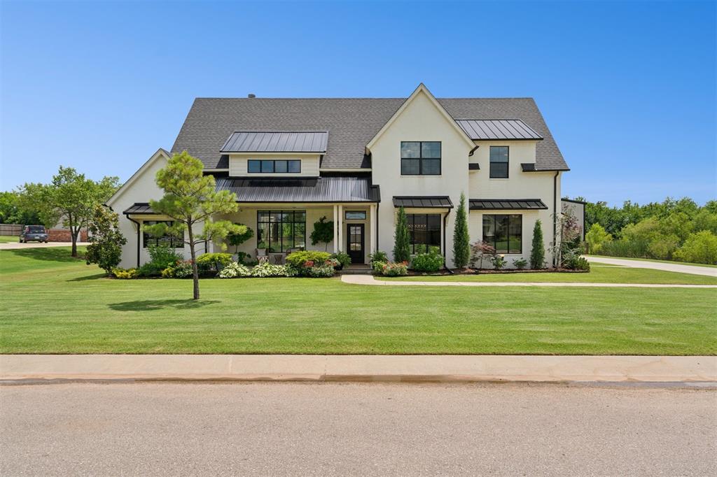 Beautifully curated home nested on over half an acre in the Timber Creek Estates community.  This 5 bedroom home offers 4 and a half baths in the main house and a full bath in the detached 30' x 40' climate controlled workshop. Gorgeous neutral color palette highlights the wood flooring with chevron accent patterns in walkway. Plus two gas log fireplaces. Chef's kitchen boasts large island beneath pendant lights, custom fit over-sized fridge/freezer, built in oven and microwave, built in gas range, canned lighting, and pantry. Split bedroom floor plan with the primary bedroom downstairs and secondary bedrooms upstairs - in addition to a 2nd living room and 2nd laundry room upstairs.. Salt water pool in back. Hair salon to be converted to office at buyers request. Sq. Ft. includes 54 SF pool bath in garage.