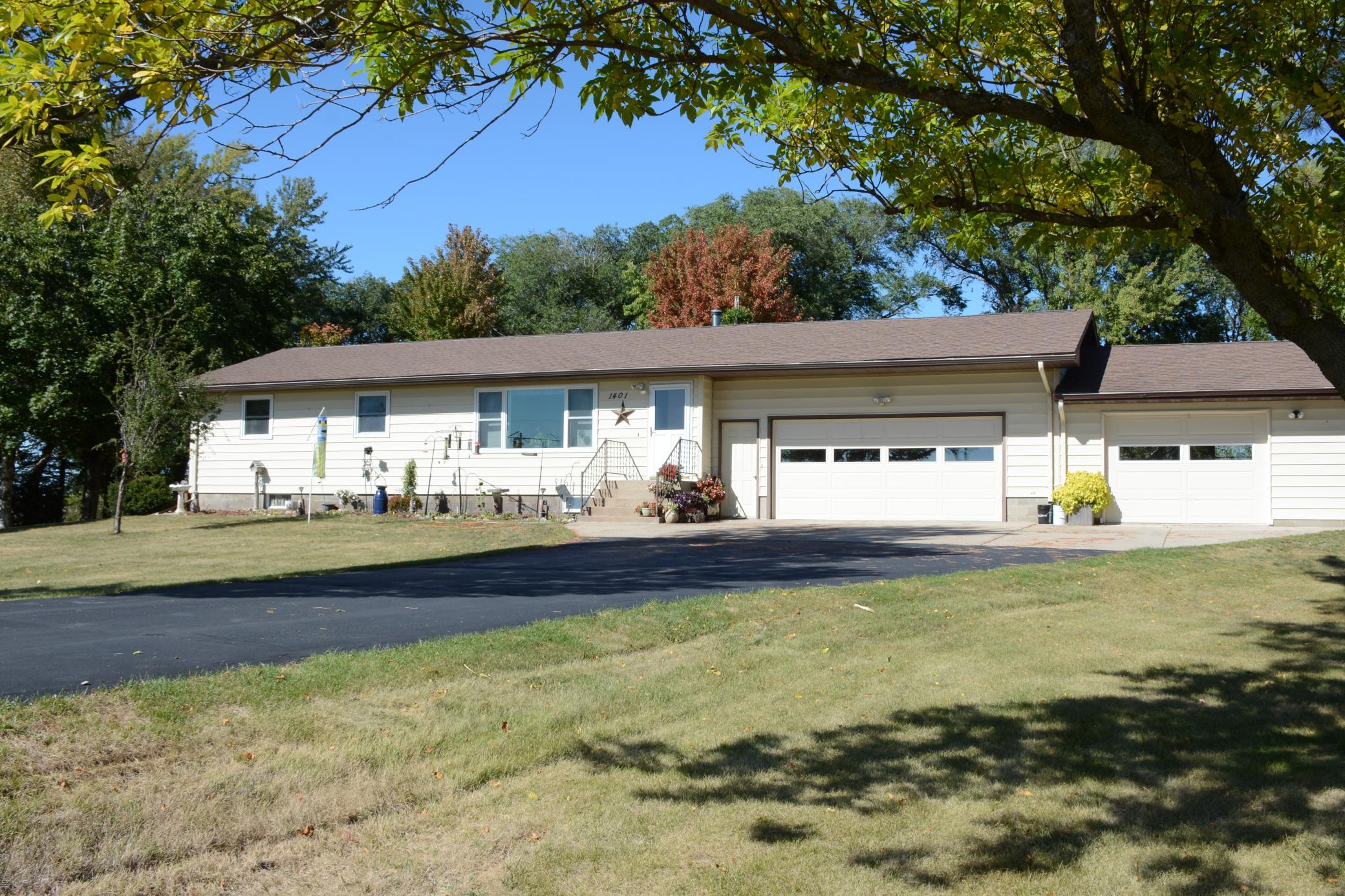 Great Rambler on a 2 acre corner lot now available in Alexandria.  Take a closer look at this 3 bedroom, 2 bath with laundry all on the main floor.  Trees and gardens off the patio and deck with a storage shed and garden shed to keep the large 3+stall garage organized.
