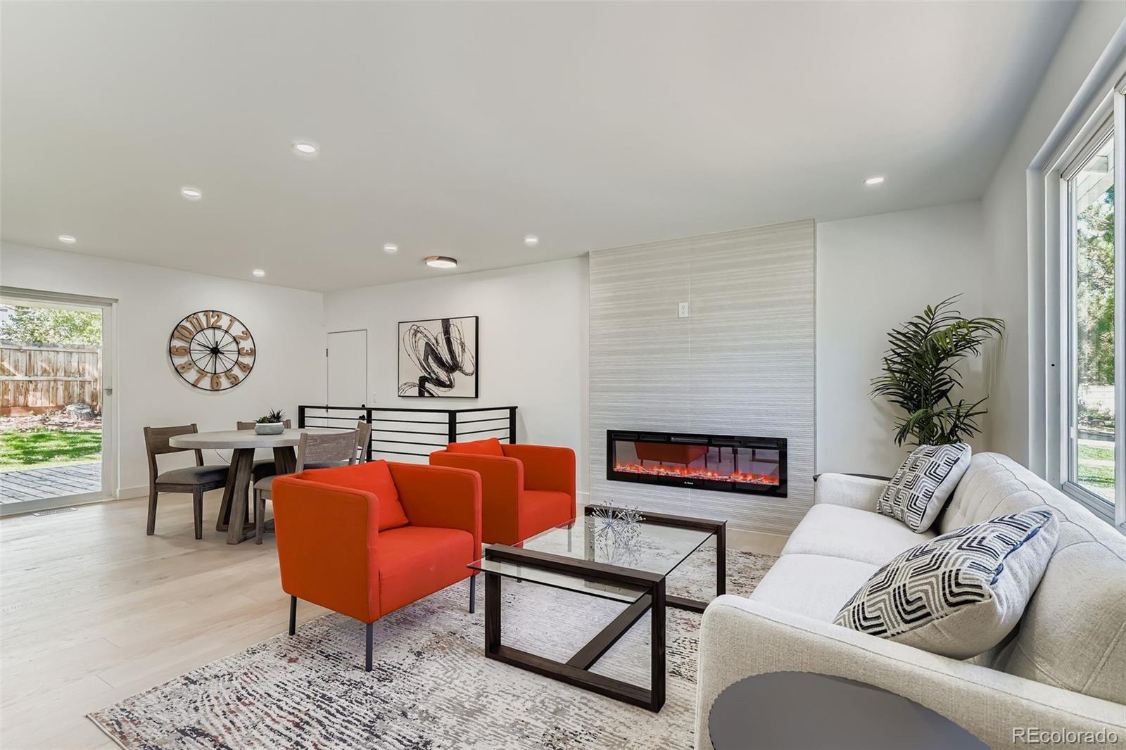 Experience refined living in this exquisitely remodeled home, where every detail has been thoughtfully curated for comfort and sophistication. The main floor showcases a stunning chef’s kitchen adorned with quartz waterfall counters, sleek cabinetry, and premium finishes. Elegant engineered flooring flows seamlessly—no carpet in sight—while smooth walls throughout create the clean, contemporary look that defines true modern living. The expanded primary suite offers a spa-inspired retreat with dual sinks and a designer shower, complemented by a beautifully updated secondary bathroom. The living room, anchored by a striking fireplace, serves as the perfect centerpiece for both relaxation and entertaining.

The lower level is equally impressive, boasting a spacious family room bathed in natural light that creates an inviting, open atmosphere rarely found in a basement. An additional elegant bathroom and an expansive bedroom with an oversized closet provide the perfect balance of style and function.

Not only beautiful, but practical as well—this home features all-new attic insulation, a brand-new AC system, and a new water heater, ensuring efficiency and peace of mind for years to come.

Outside, the beauty continues with brand-new sod, lush professional landscaping, a modern sprinkler system, and a newly installed fence, all creating a serene private oasis. This property is the perfect blend of luxury, sophistication, and modern comfort—ready to welcome its next discerning owner.
