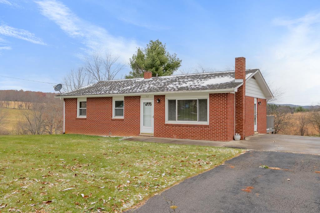 Beautiful 3 BR 2 BA brick ranch home on approximately half an acre in Bland, VA! Includes a full unfinished walk out basement with two chimneys. Features include hardwood and laminate flooring throughout the main level, existing kitchen appliances convey, laundry on main, insulated tilt windows, and a newer heat pump for heating and cooling. Exterior features include the open rear deck, private well and septic, shingle roof, and paved driveway/street. Located 1.5 miles from I-77 and only a few minutes from the post office, courthouse, rescue squad, grocery store, auto repair shops and the rest of town. This is a very nice home and ready for you to move in!