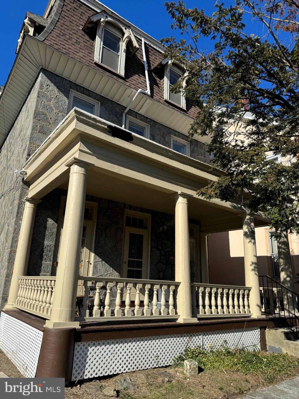 Welcome to 201 Rochelle Avenue - a rare opportunity to enjoy the comfort and space of a beautifully updated single-family home with the added advantage of built-in rental income. The move-in-ready first floor is ideal as an owner’s residence, offering a spacious 2-bedroom, 1-bath layout plus a dedicated dining room or flexible bonus space ideal for a home office, playroom, or additional living area.The heart of the home is the generously sized kitchen, thoughtfully designed with room for an eat-in setup or cozy breakfast nook. Recently renovated, it features stainless steel appliances, granite countertops, ample cabinetry, and a layout that’s perfect for both everyday living and entertaining. Throughout the main level, you’ll find brand-new luxury vinyl plank flooring, central air and heat, and the convenience of an in-unit washer and dryer. The beautifully updated bathroom showcases high-end fixtures and modern finishes.Step outside from the main level to enjoy a private patio and backyard, along with a rear porch—ideal for hosting gatherings or relaxing outdoors. A charming front porch adds to the home’s inviting curb appeal and provides yet another space to unwind.Upstairs, two well-maintained 1-bedroom, 1-bath apartments generate consistent rental income and help offset monthly expenses. Both units are tenant-occupied and include window AC and baseboard heat. The second-floor unit has been renovated with new LVP flooring, an updated kitchen and bathroom, and in-unit laundry, while the third-floor unit offers new LVP flooring, an updated bathroom, and new kitchen appliances. Located on a quiet, tree-lined block near public transportation, this home offers the perfect blend of space, flexibility, and smart homeownership.