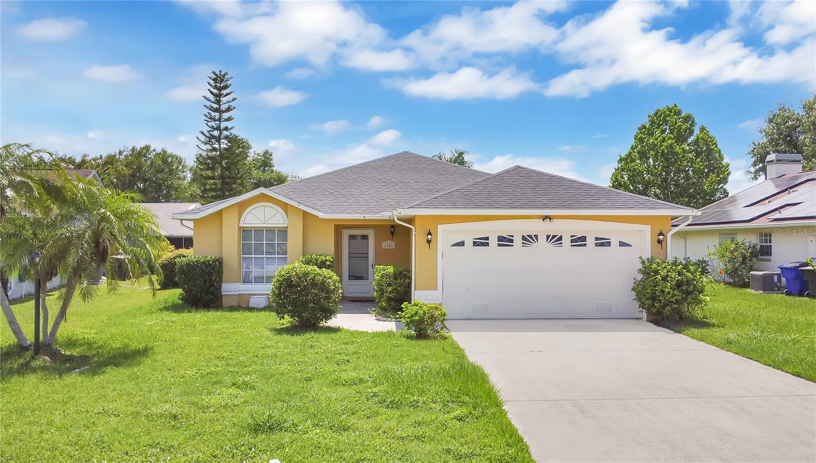 Right when you pull in, you’ll notice this home sits tucked into a cul-de-sac?  No through traffic, wider driveway, and a two-car garage. Laminate flooring extends throughout the entire house, setting the tone for easy, low-maintenance living. Step inside, and you’ve got a simple, open layout that connects the living room and dining area, which leads to the kitchen. This split floor plan features two bedrooms and a guest bathroom on one side, and the primary bedroom with a walk-in closet and en-suite on the other, providing privacy when you want downtime. Through sliding glass doors?, the enclosed back porch adds extra entertainment space? or a great area to unwind after a long day. Beyond the porch, there's a huge yard with plenty of room for play, gardening, or that pool you’ve been thinking about. With low HOA fees, you’ve got flexibility and fewer rules to stress over. You’re less than 10?minutes from historic Downtown St. Cloud lined with local shops, colorful murals, weekend markets, and casual eateries for a stroll, grab a bite, or hear live music. If you love the outdoors, East Lake Tohopekaliga and Lakefront Park — offering playgrounds, fishing piers, and scenic walking trails, are just a few minutes away. Commuters will appreciate being within 25 miles of downtown Orlando, with easy access to 192 and 441 for weekend trips, airport shuttles, or theme-park runs. With low local traffic and a laid-back suburban feel but still close to city perks, this spot gives you the best of both worlds. Overall, this home checks all the boxes for practical living: no carpets, functional layout, bonus porch space, and a yard that’s ready to grow with you.
