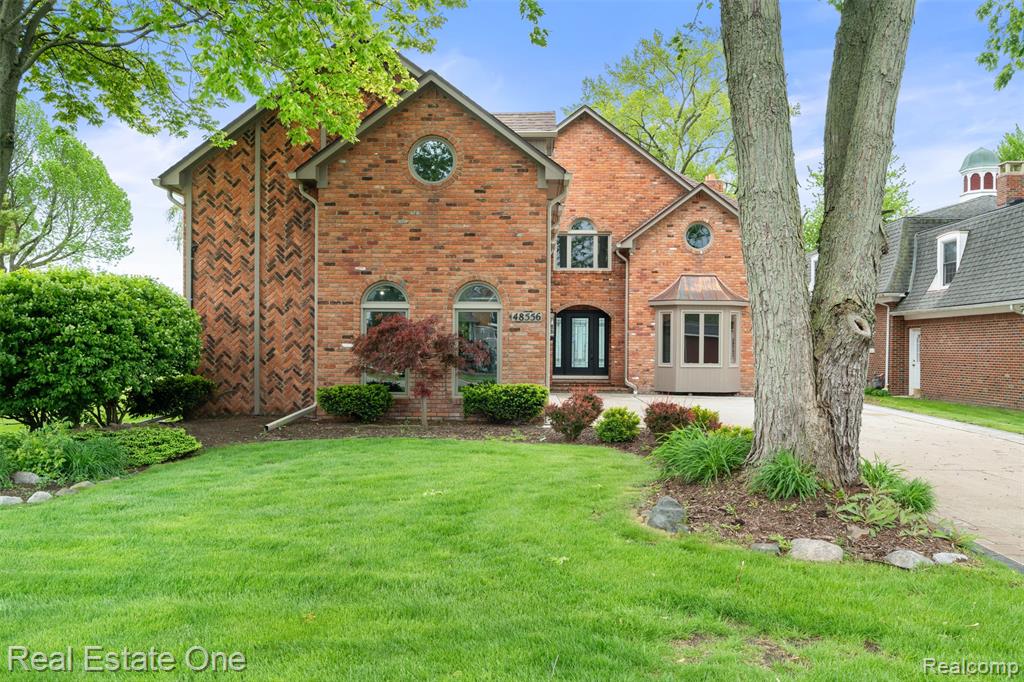 Waterfront Luxury on Anchor BayThis stunning Lakefront and canal-front home offers direct backyard access to the water, complete with a private dock and boat hoist—perfect for lake living. A beautifully updated brick exterior welcomes you with brand-new windows, front and garage doors, modern lighting, and an extended driveway. Step inside to find marble flooring throughout the first level, a spacious open layout, and a first-floor primary en suite featuring a walk-in shower and custom California closet. The living room featuring floor-to-ceiling windows overlooking Anchor Bay and an electric fireplace, while the dining area includes an additional fireplace and built-in TV. The chef’s kitchen is equipped with top-of-the-line Viking appliances, including a range, counter depth refrigerator, dishwasher, microwave, warming oven, and a large island with a prep sink. A stylish half bath and first-floor laundry add convenience. Upstairs, you’ll find two generously sized bedrooms with brand-new plush carpeting, and a second luxurious primary en suite with a private balcony, California closet, double vanity, two-person shower, soaking tub, and separate water closet.
Additional highlights include a whole-house generator, solid core doors throughout, a three-car attached garage with epoxy flooring, access to a large bonus room above, and a deep, clean concrete crawl space—ideal for storage and peace of mind.